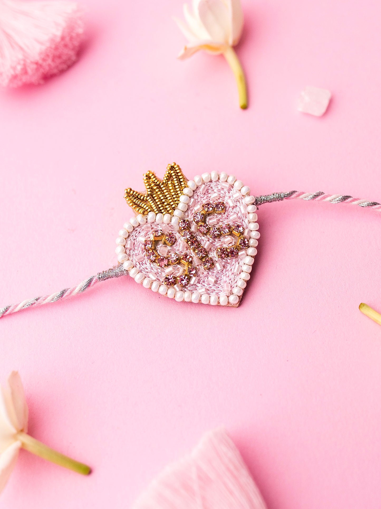 Decorative sister rakhi with heart-shaped sis text