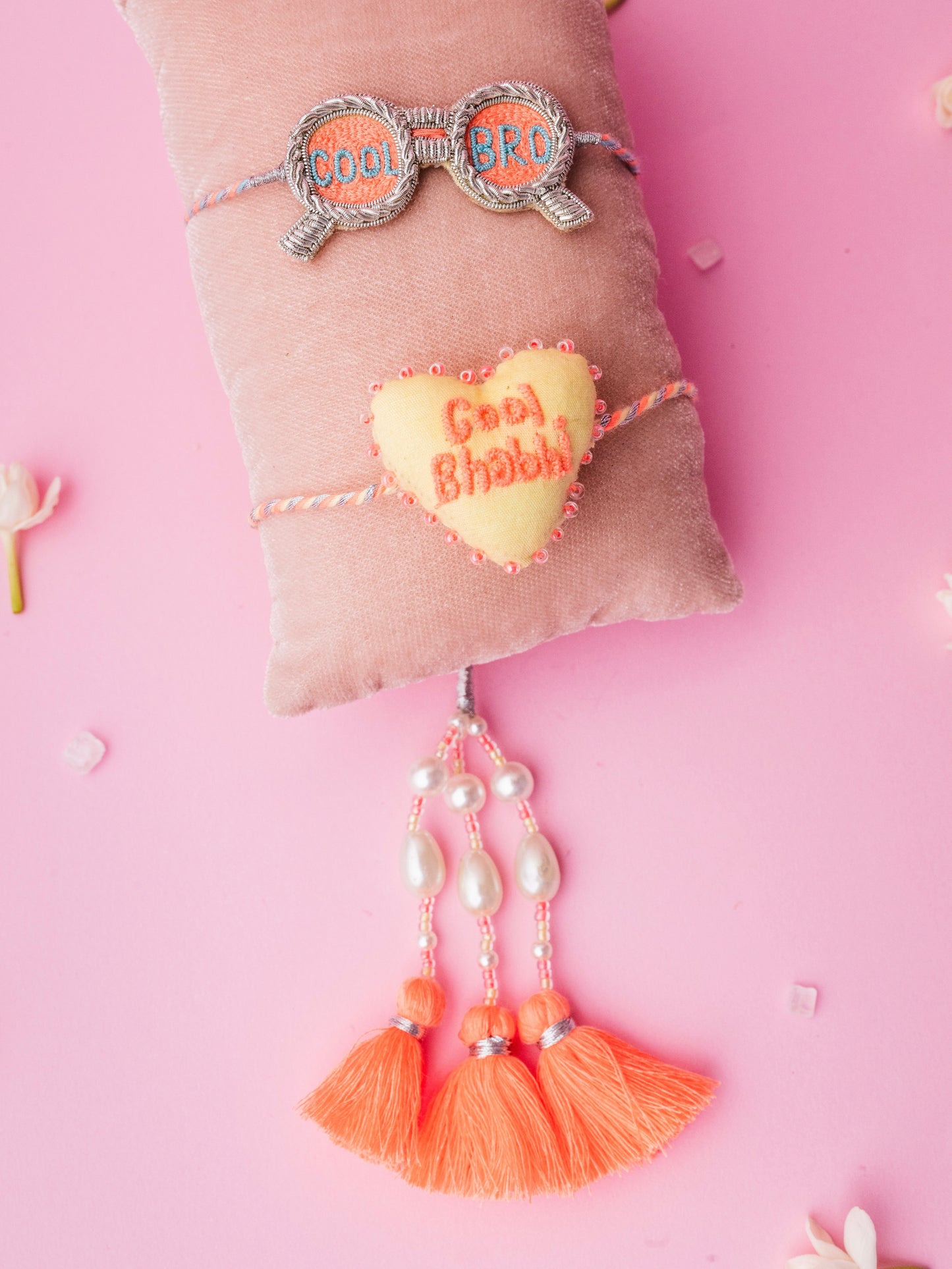 Describe cool bro rakhi and cool bhabhi lumba combo with tassel and pearl detail
