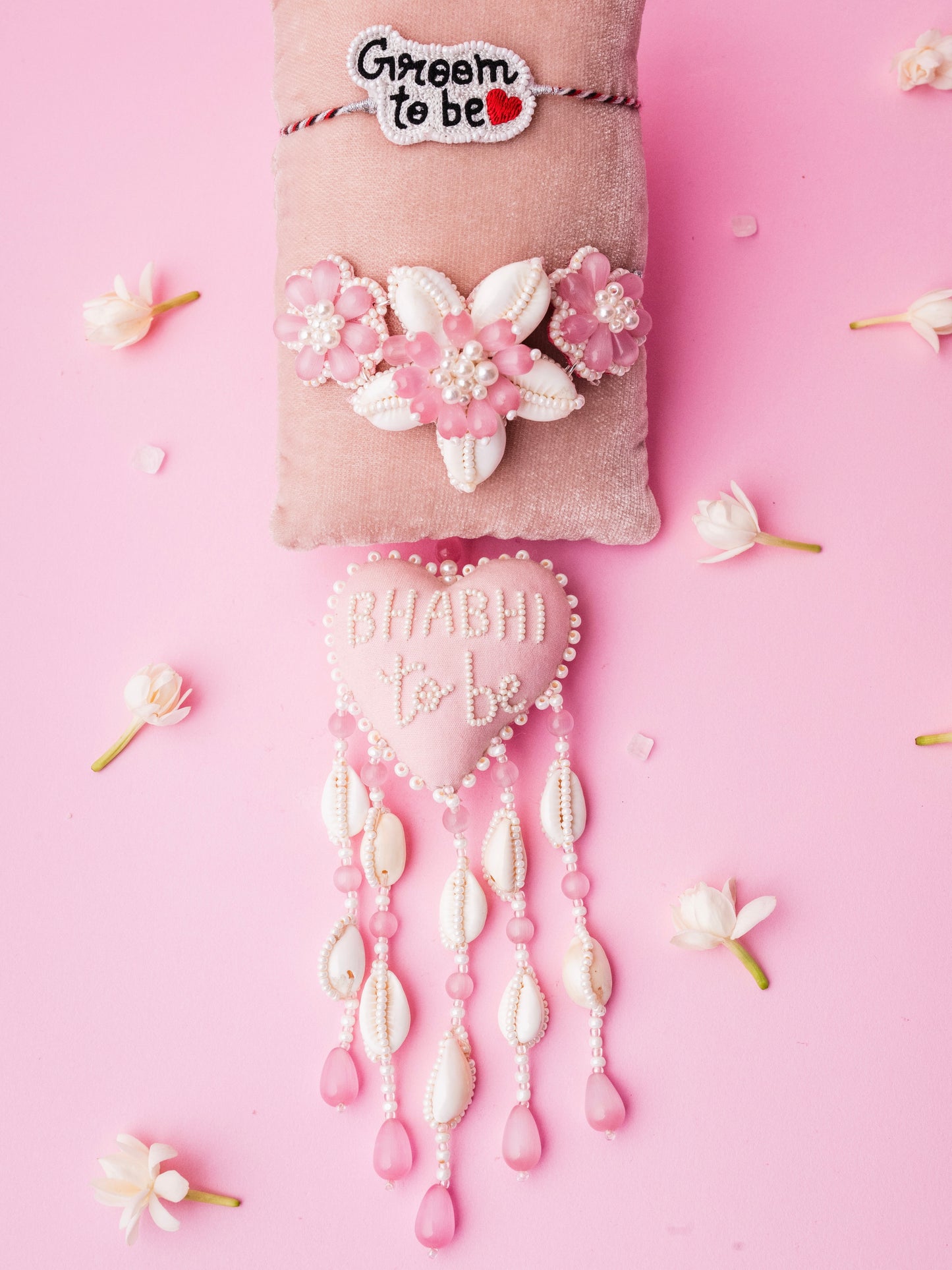 Decorative groom to be rakhi and bhabhi to be lumba with floral details and