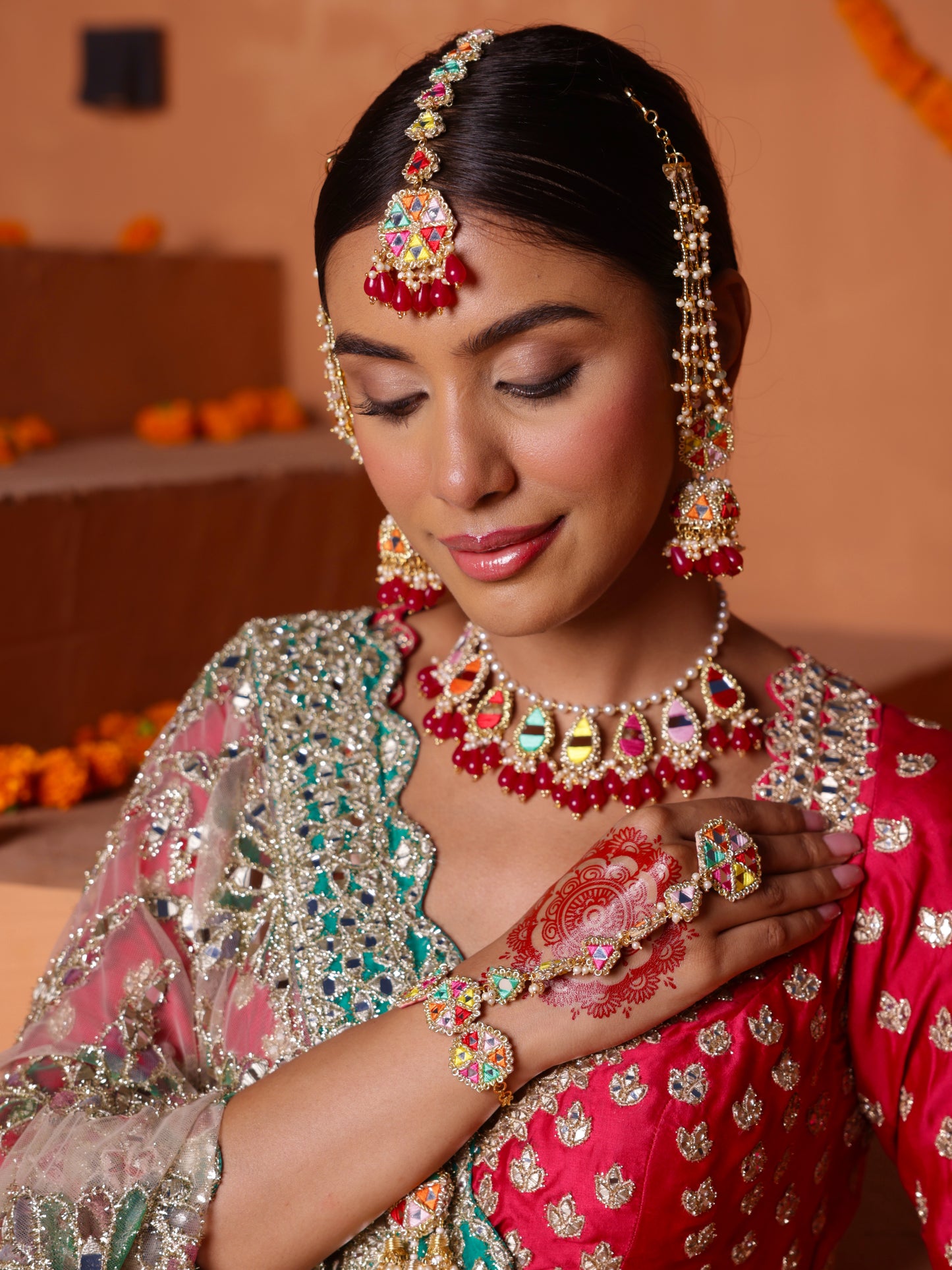 Gulaal (Jhumki Earrings with Earchain, Mangtikka, Sleek Necklace & Pair of Hathphool Set)