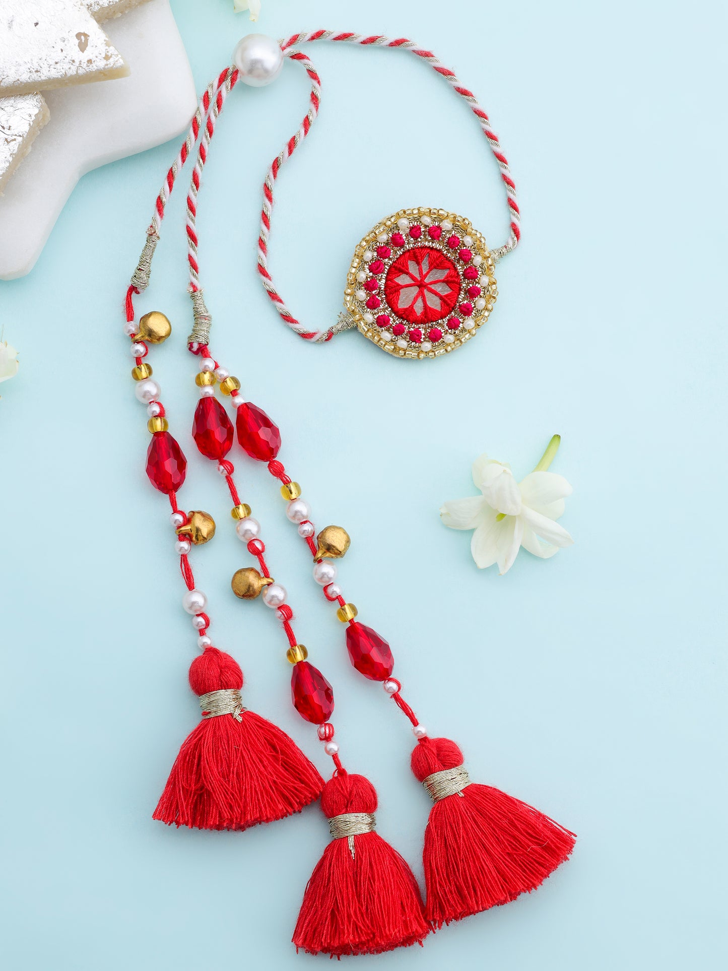 Decorative traditional red lumba with pearl and tassel detail