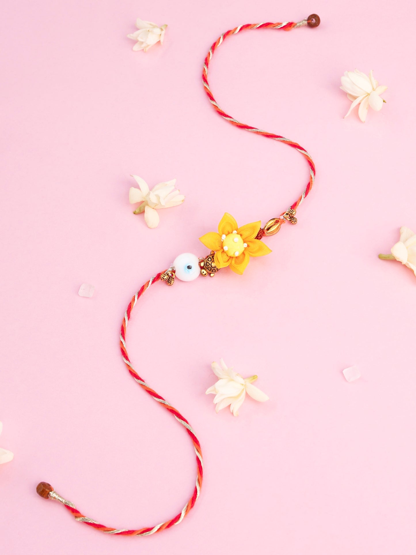 Handmade Floral Evil Eye Brother Rakhi - Yellow for Raksha Bandhan gifting