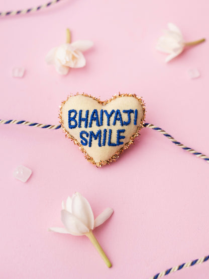 Decorative rakhi with bhaiyaji smile text 