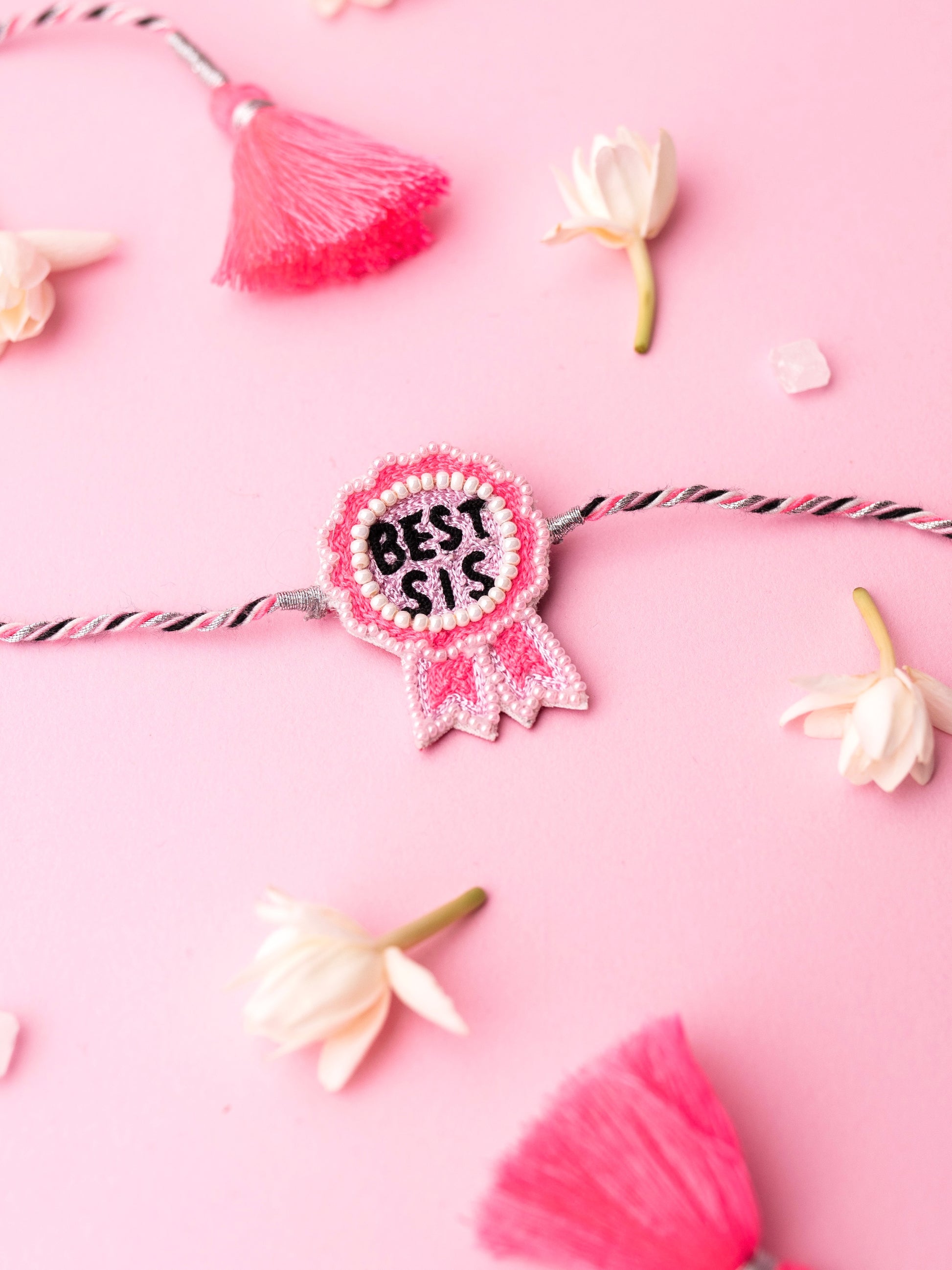 Decorative sister rakhi with best sis text
