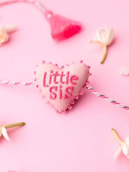 Decorative sister rakhi combo with heart-shaped 3D little sis text