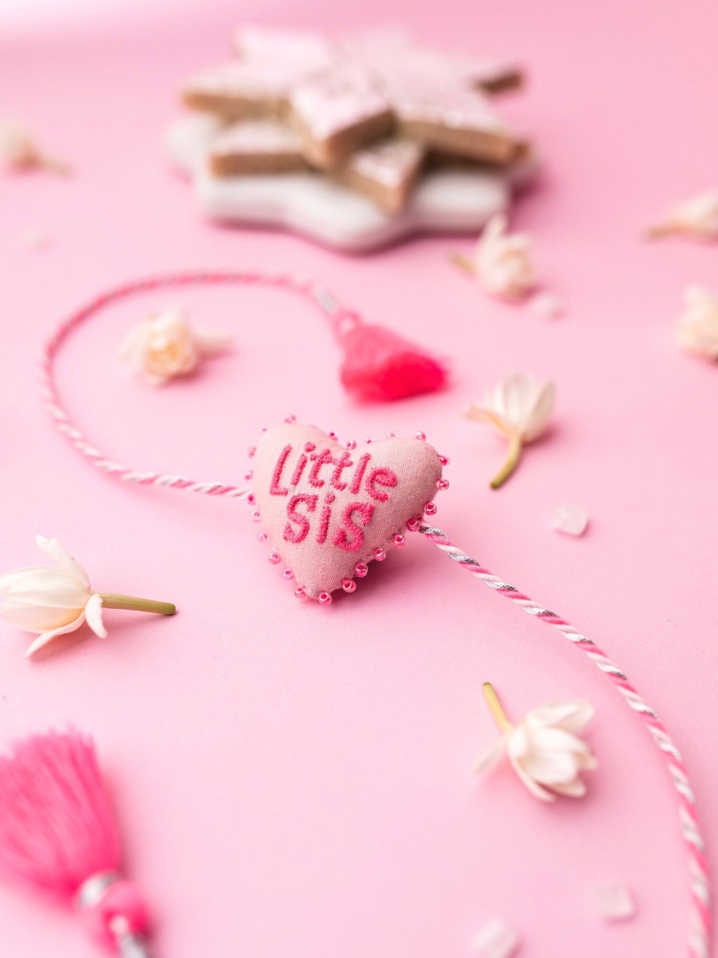 Decorative sister rakhi combo with heart-shaped 3D little sis text
