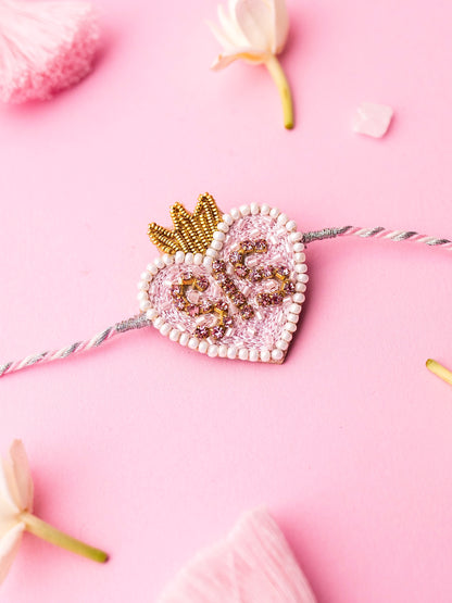 Decorative sister rakhi with heart-shaped sis text