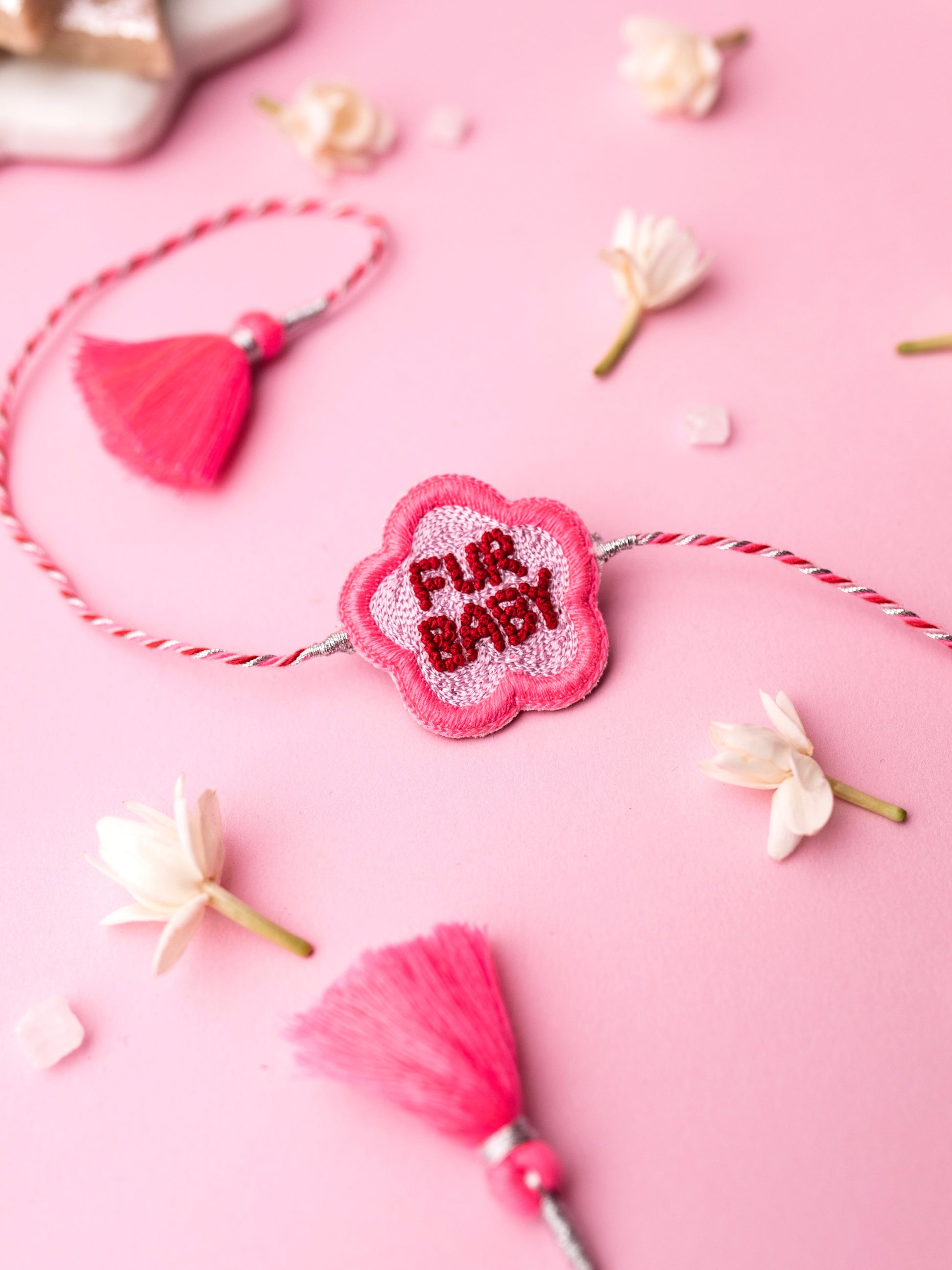 Decorative pet rakhi with fur baby text