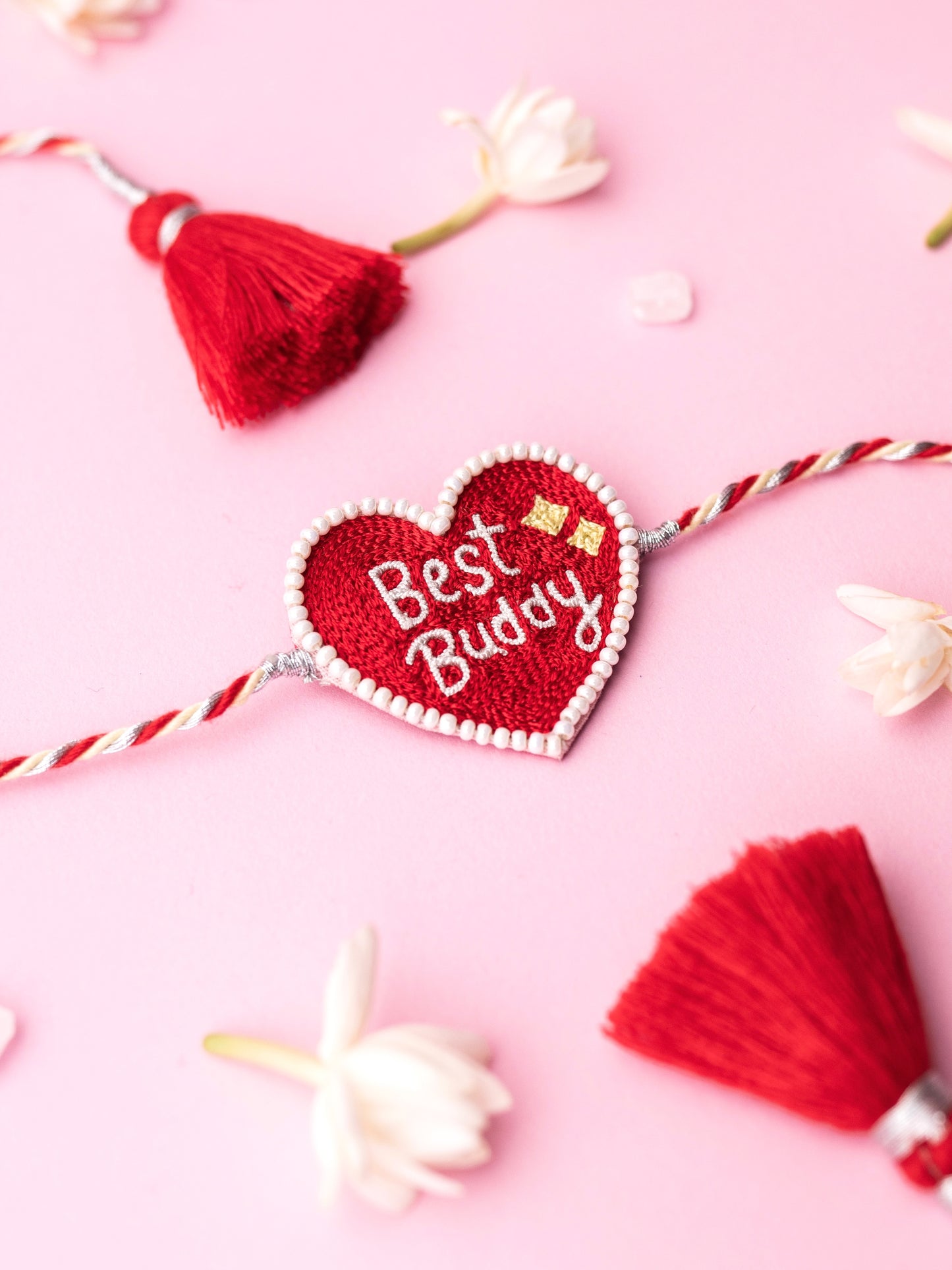 Decorative pet rakhi with pawsome text