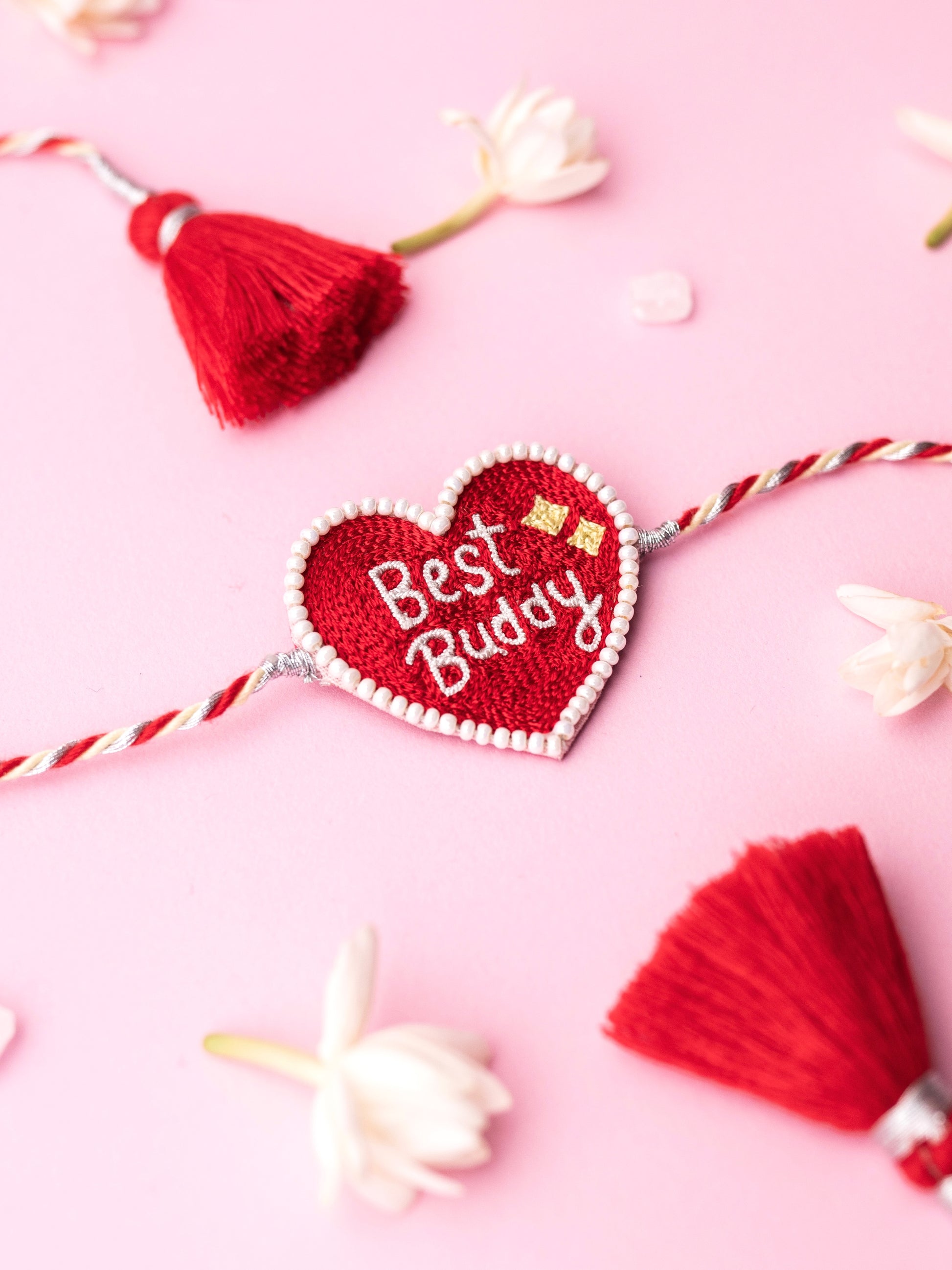 Decorative pet rakhi with pawsome text