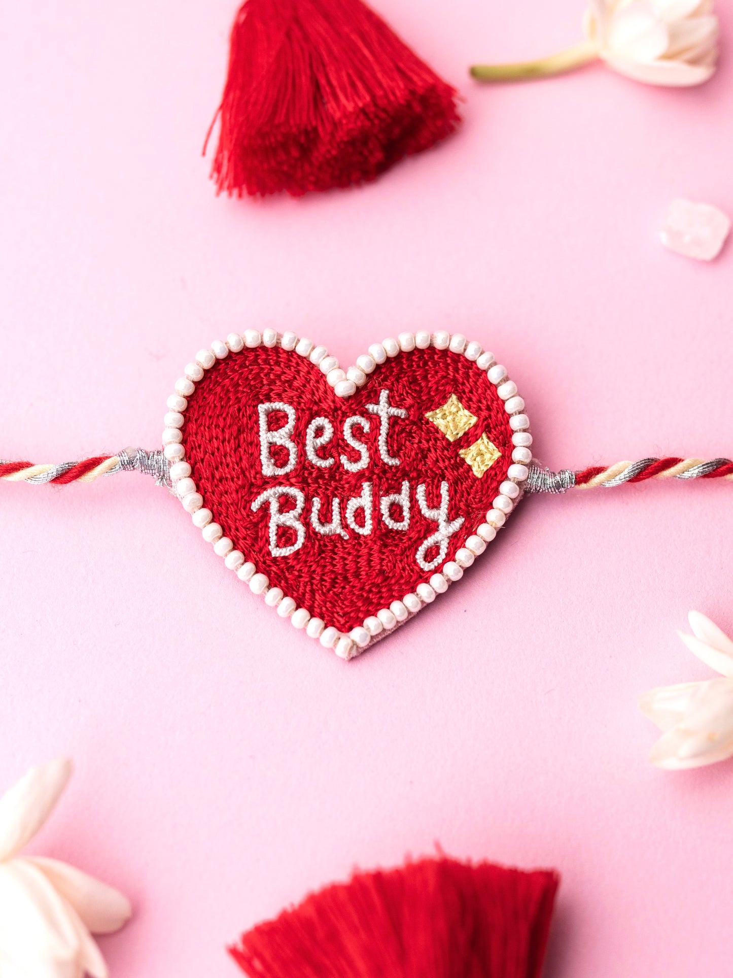 Decorative pet rakhi with pawsome text