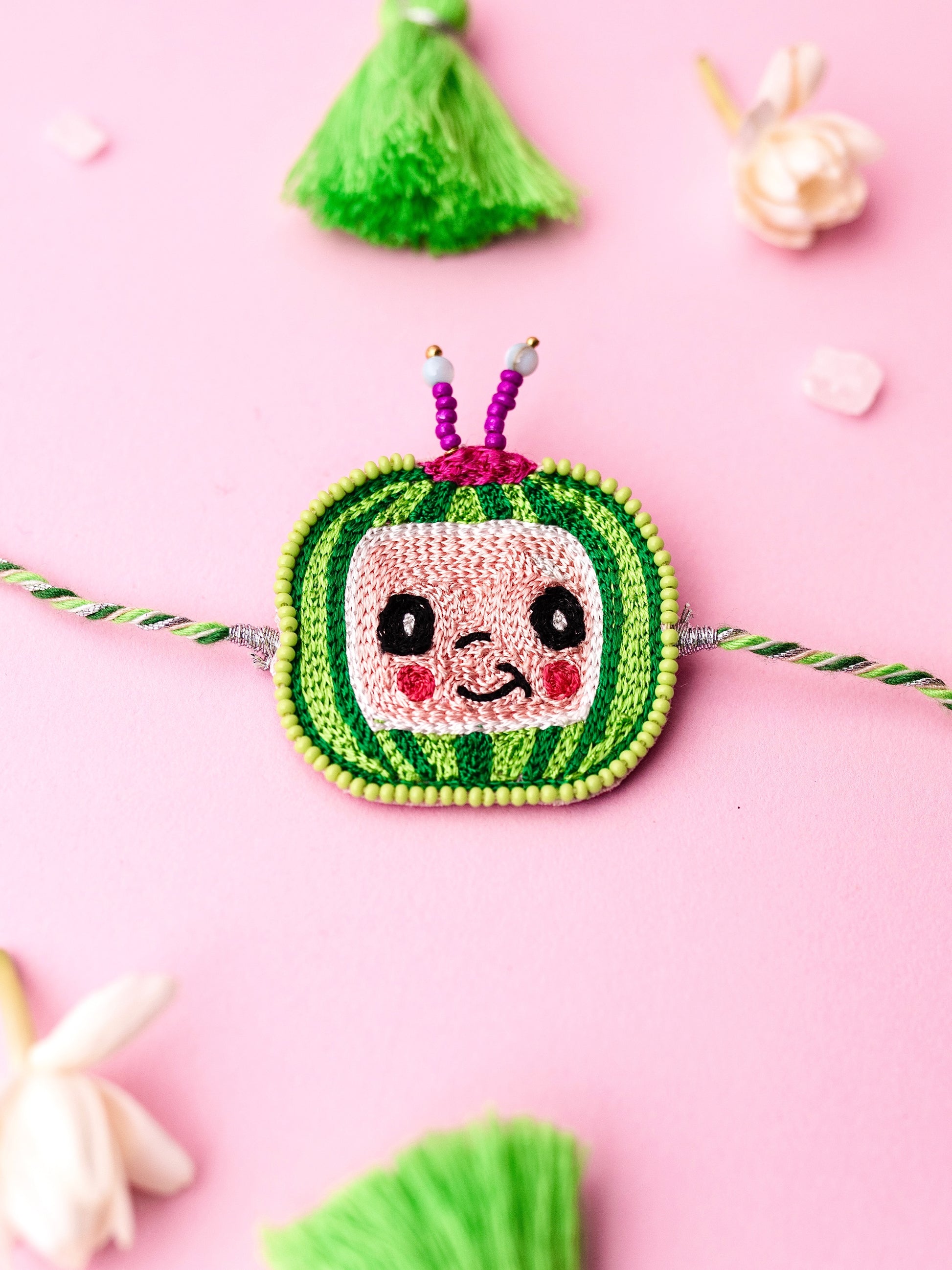 Decorative melon kids rakhi