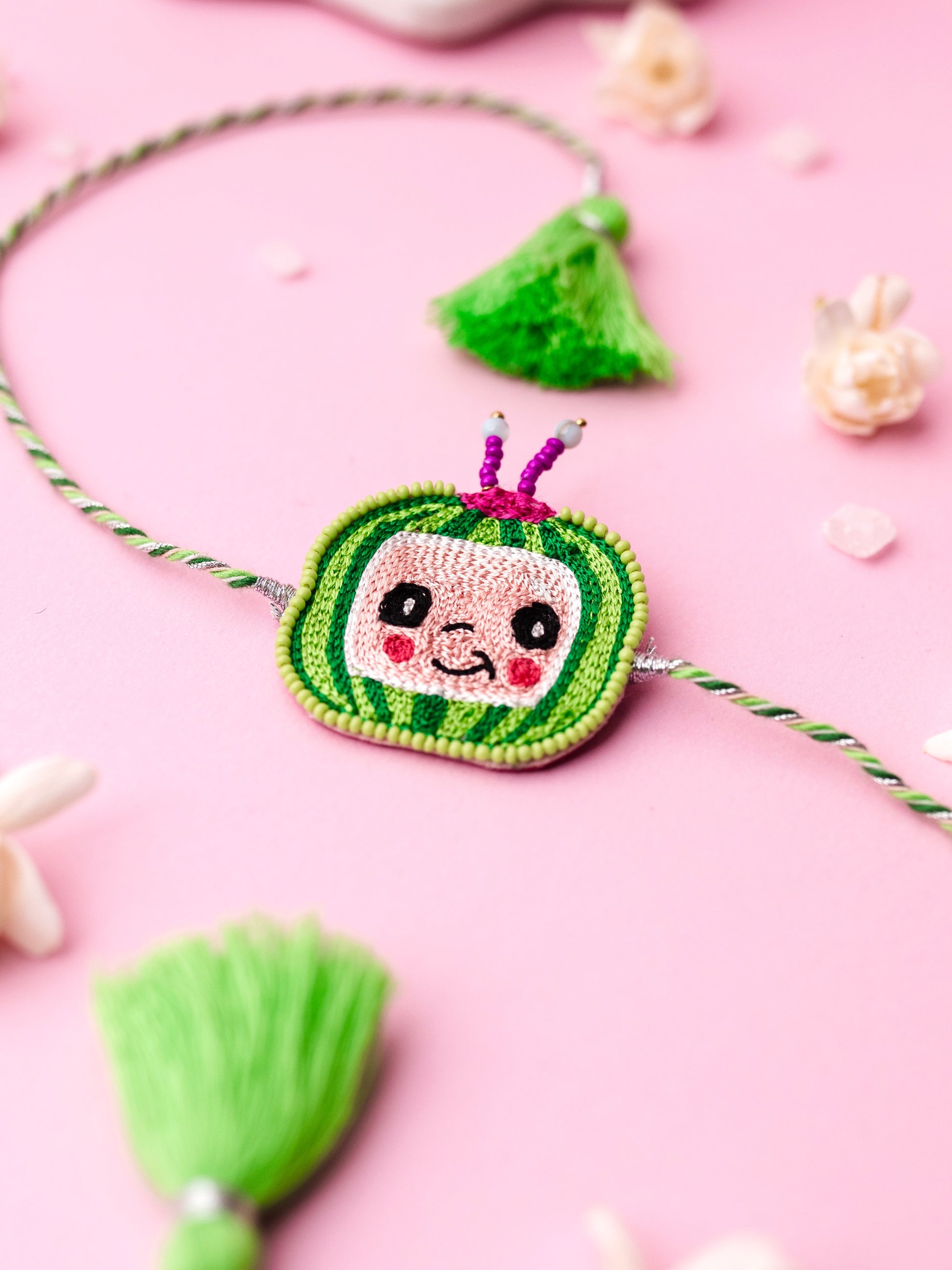 Decorative melon kids rakhi