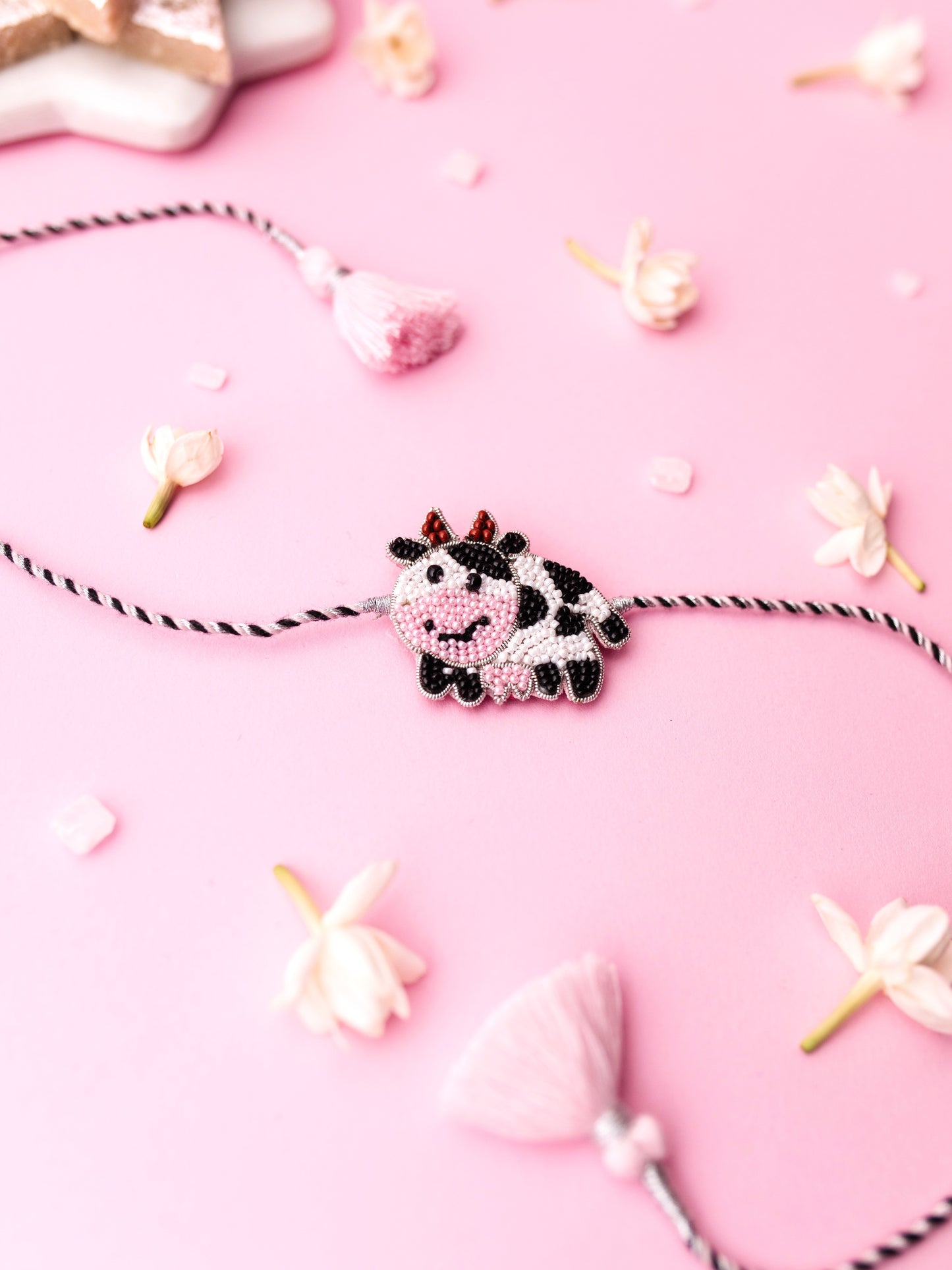Decorative cow kids rakhi