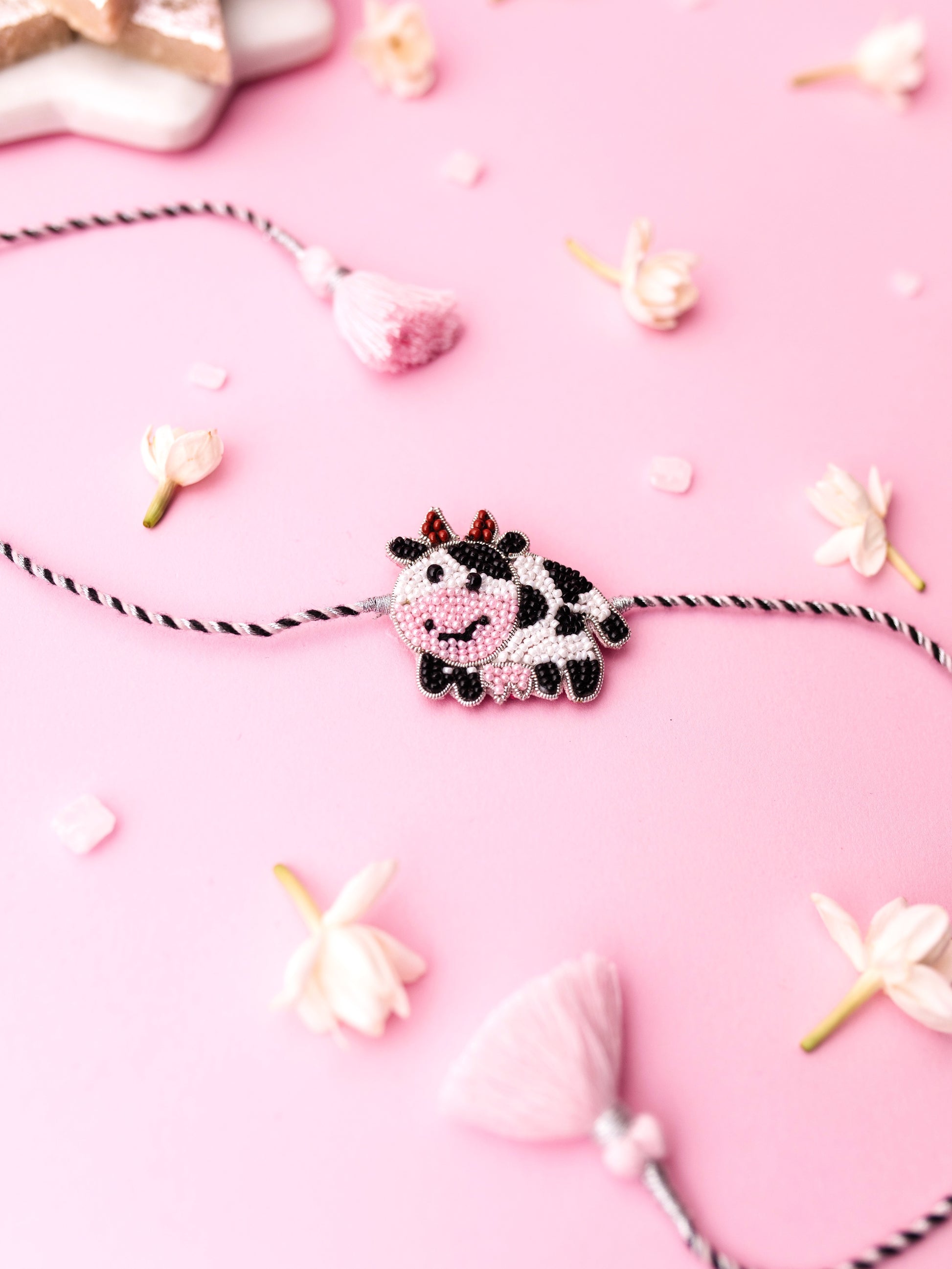Decorative cow kids rakhi