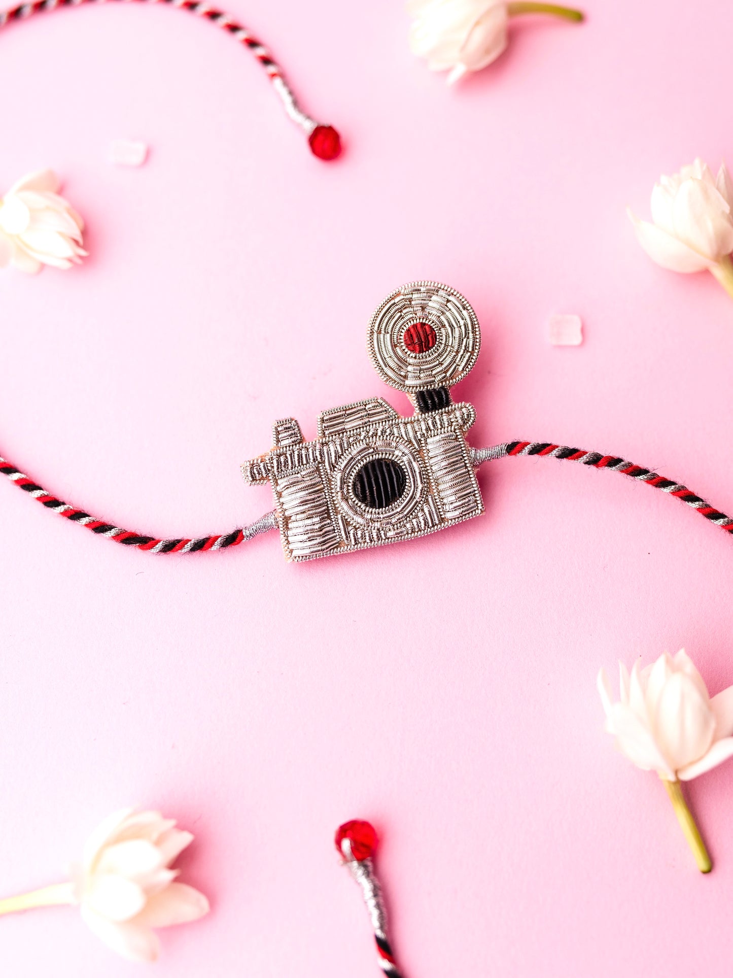 Decorative camera brother rakhi