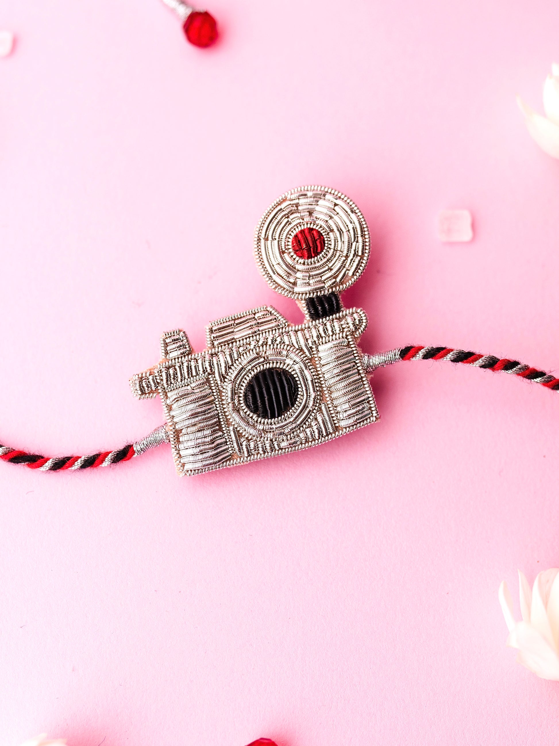 Decorative camera brother rakhi