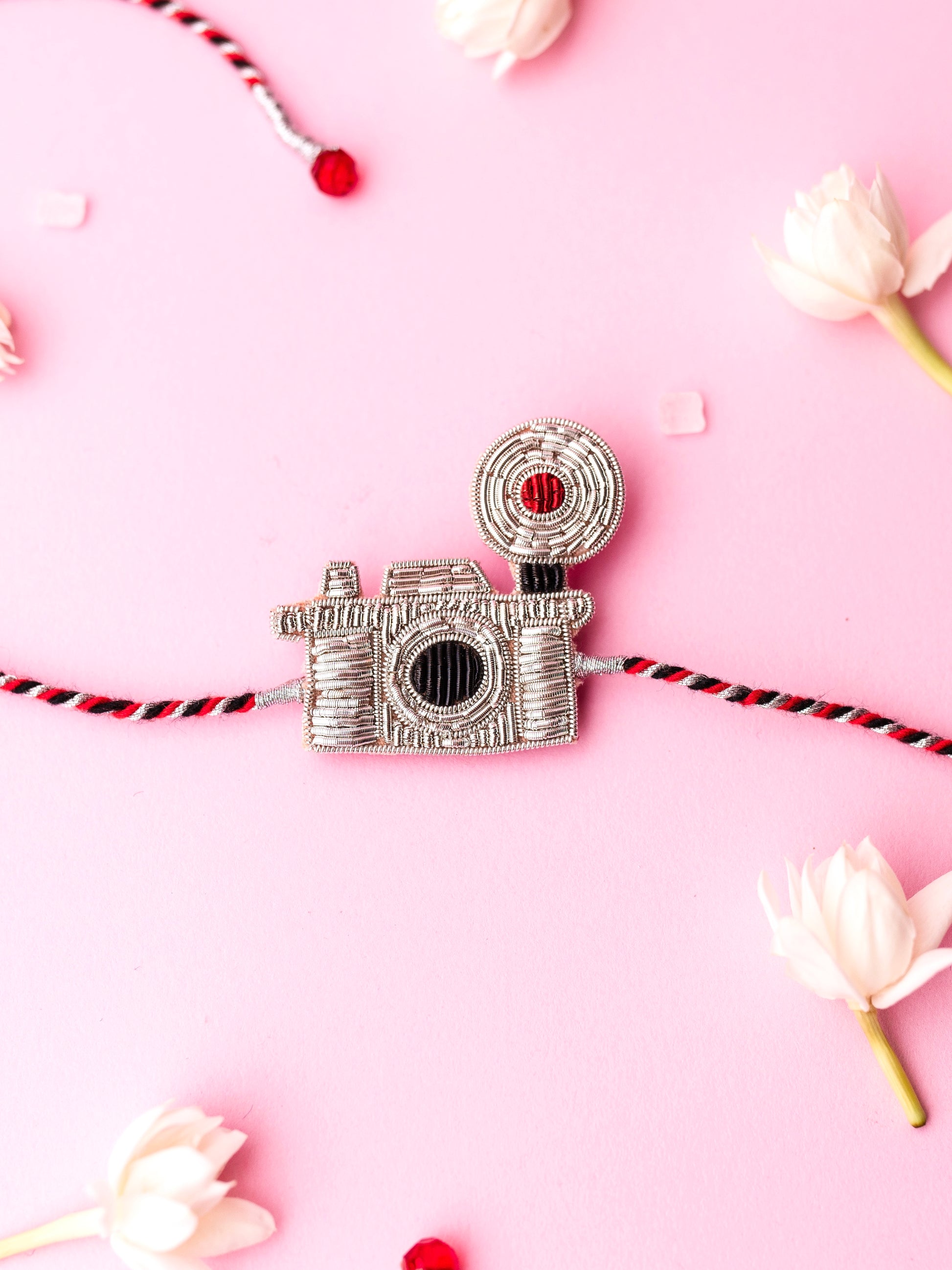 Decorative camera brother rakhi