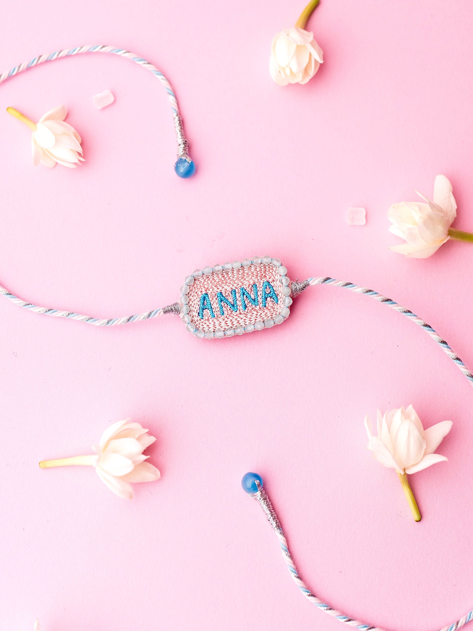 Decorative brother rakhi with Anna text