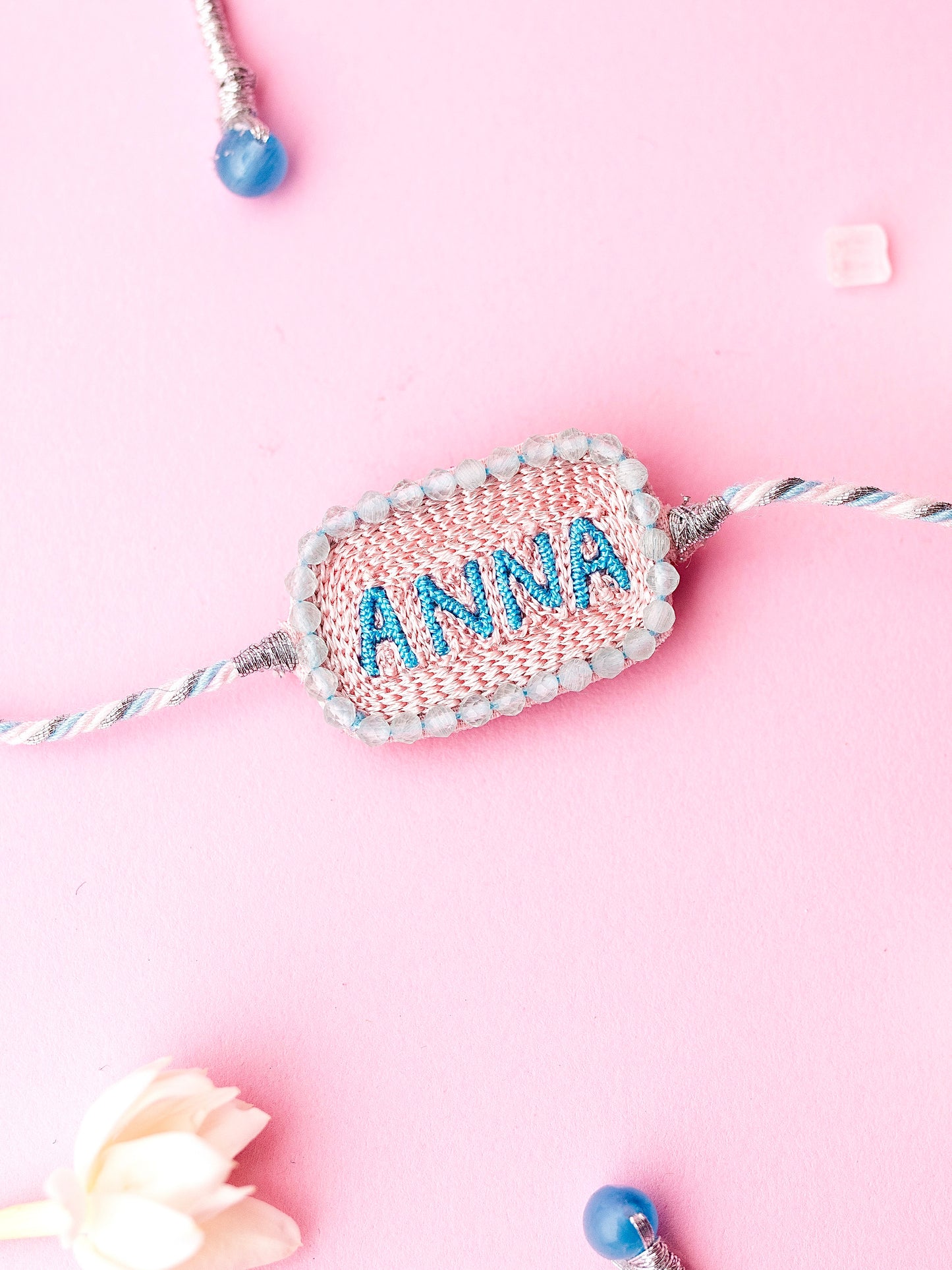Decorative brother rakhi with Anna text