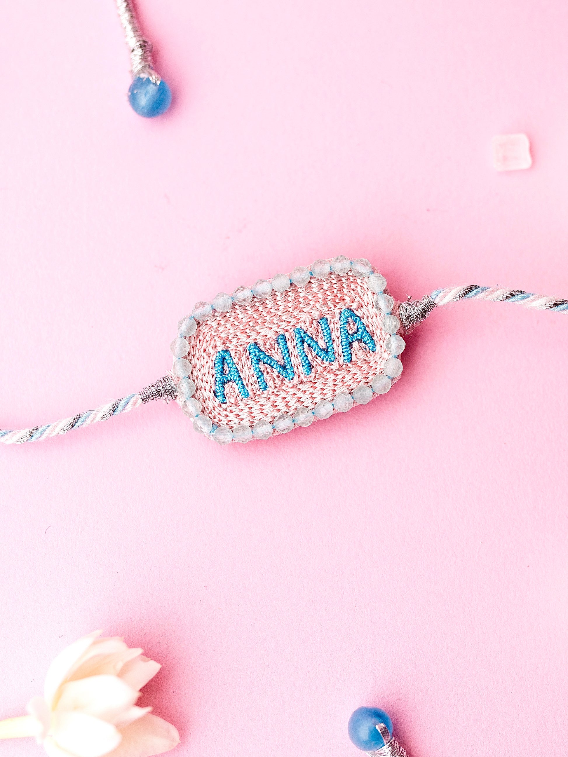 Decorative brother rakhi with Anna text