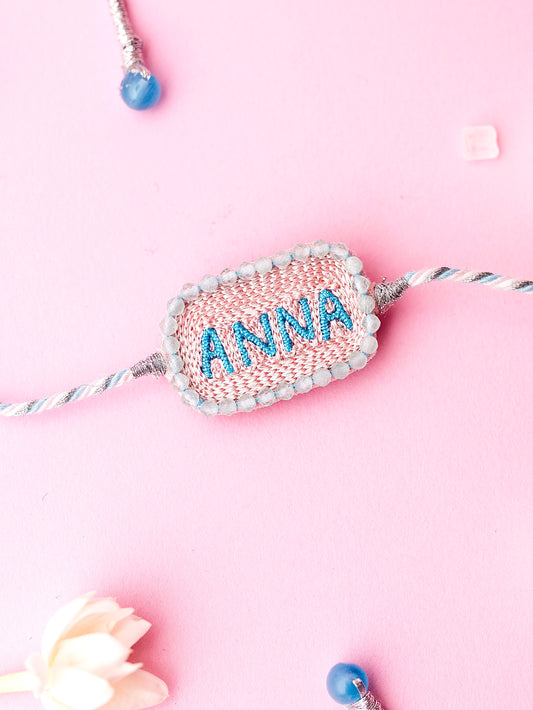 Decorative brother rakhi with Anna text