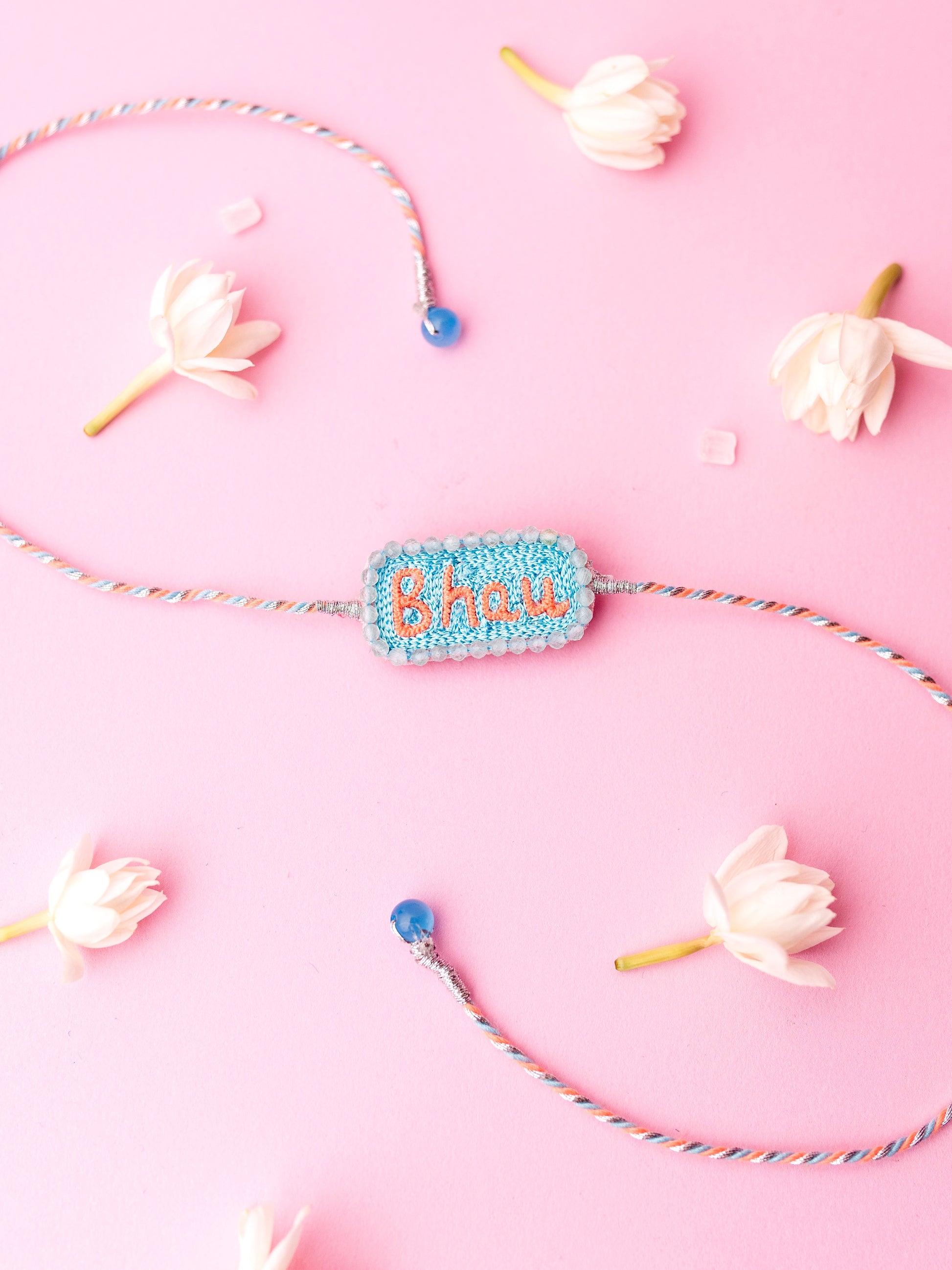 Decorative brother rakhi with bhau  text