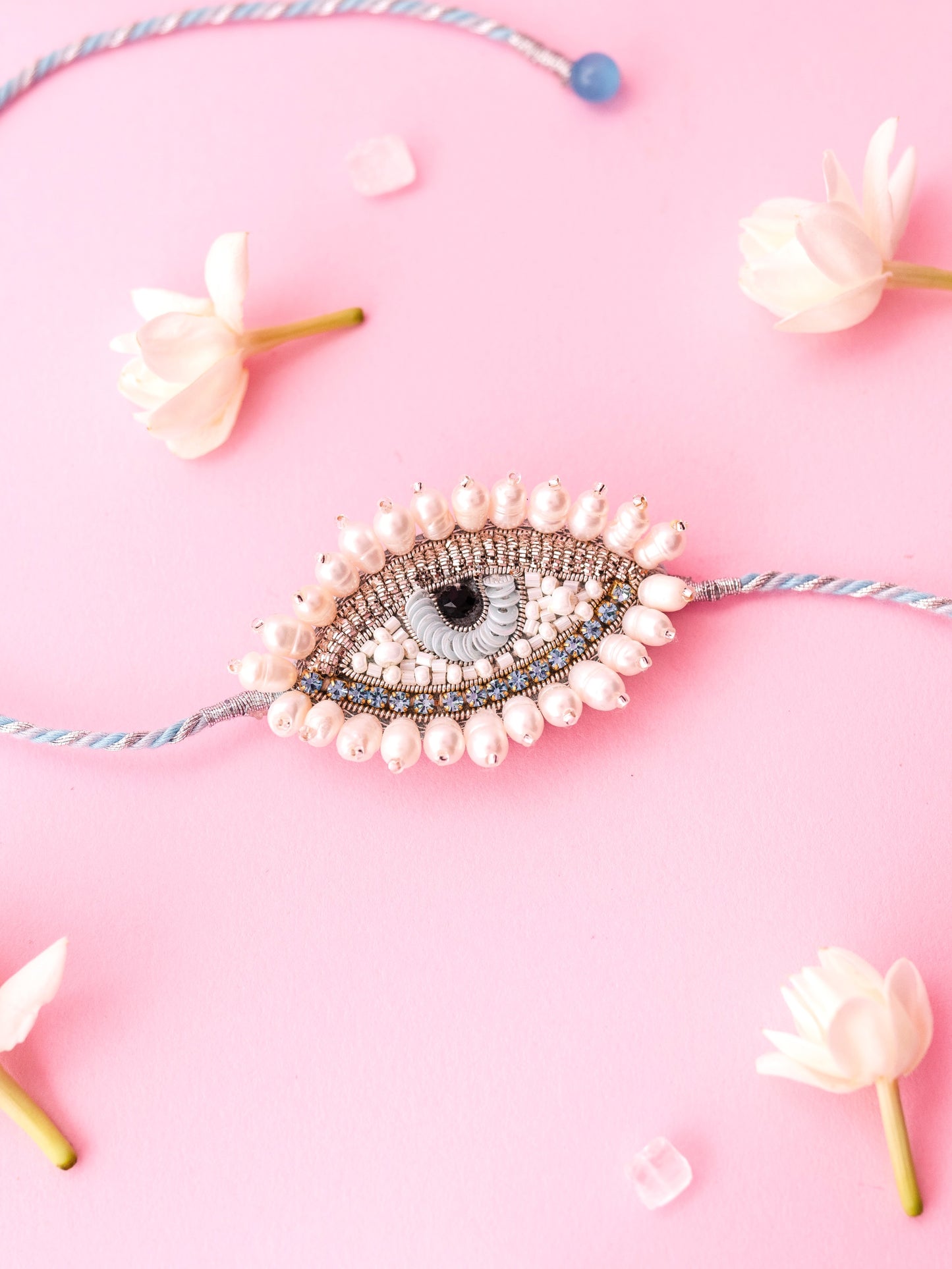 Decorative rakhi with an evil eye design