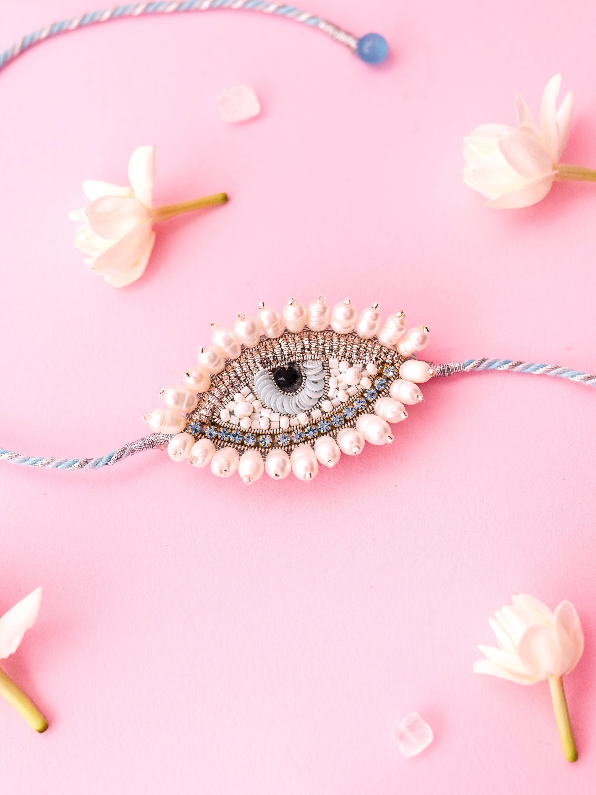 Decorative rakhi with an evil eye design