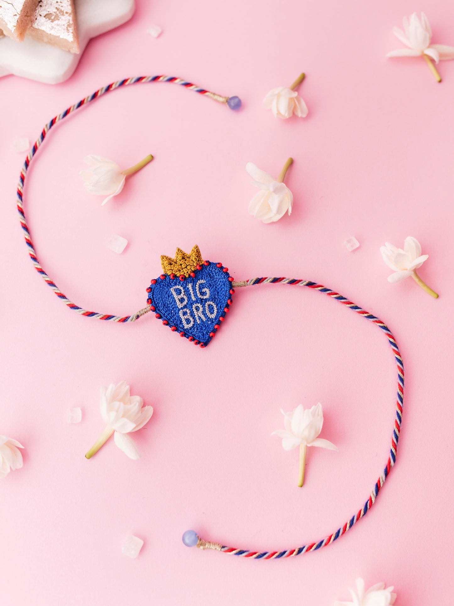 Decorative brother rakhi with  heart shaped big bro text