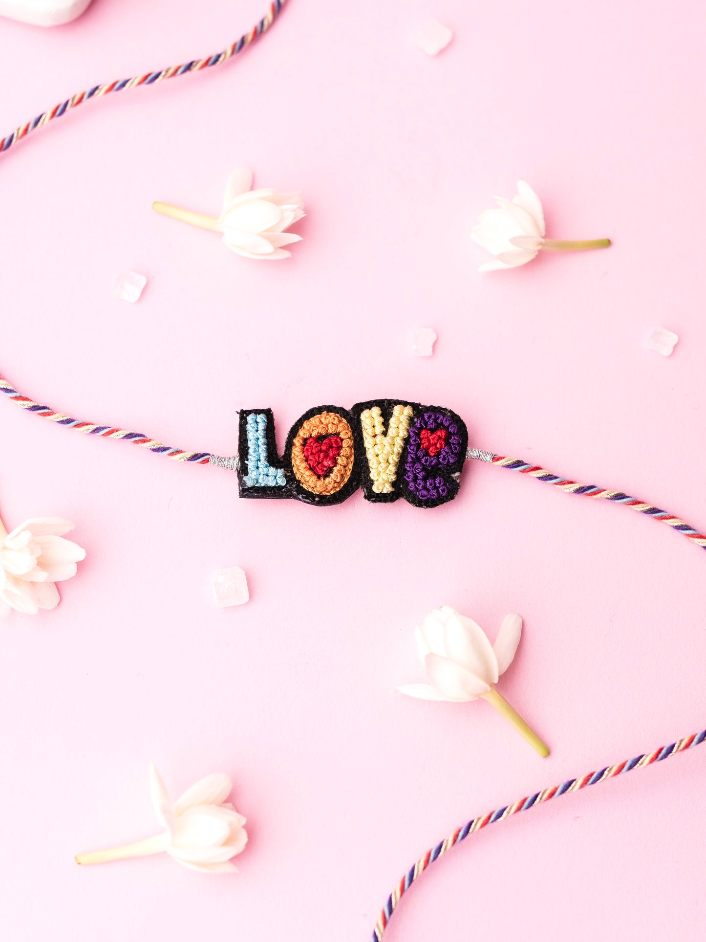 Decorative kid rakhi with love text