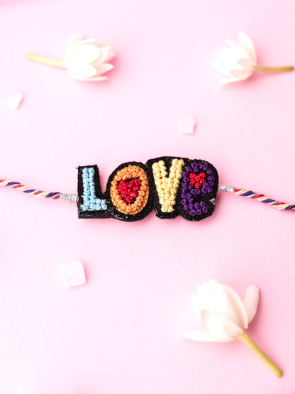 Decorative kids rakhi with love text