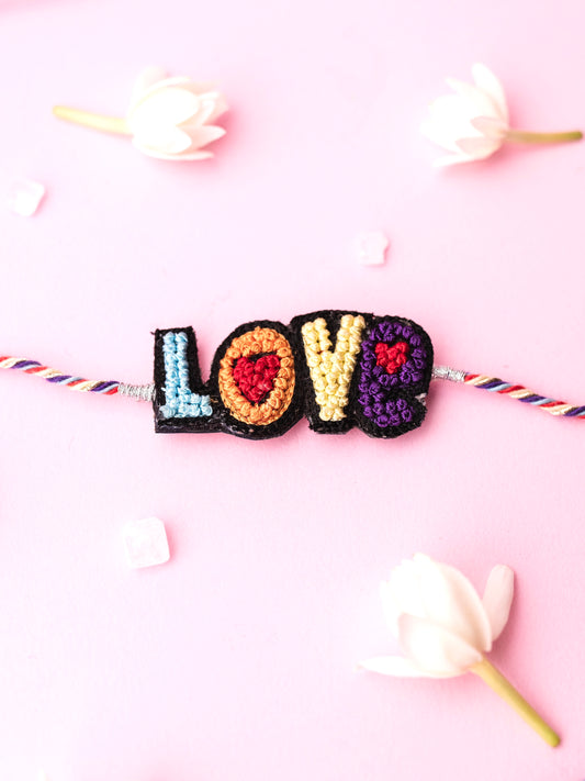 Decorative kids rakhi with love text