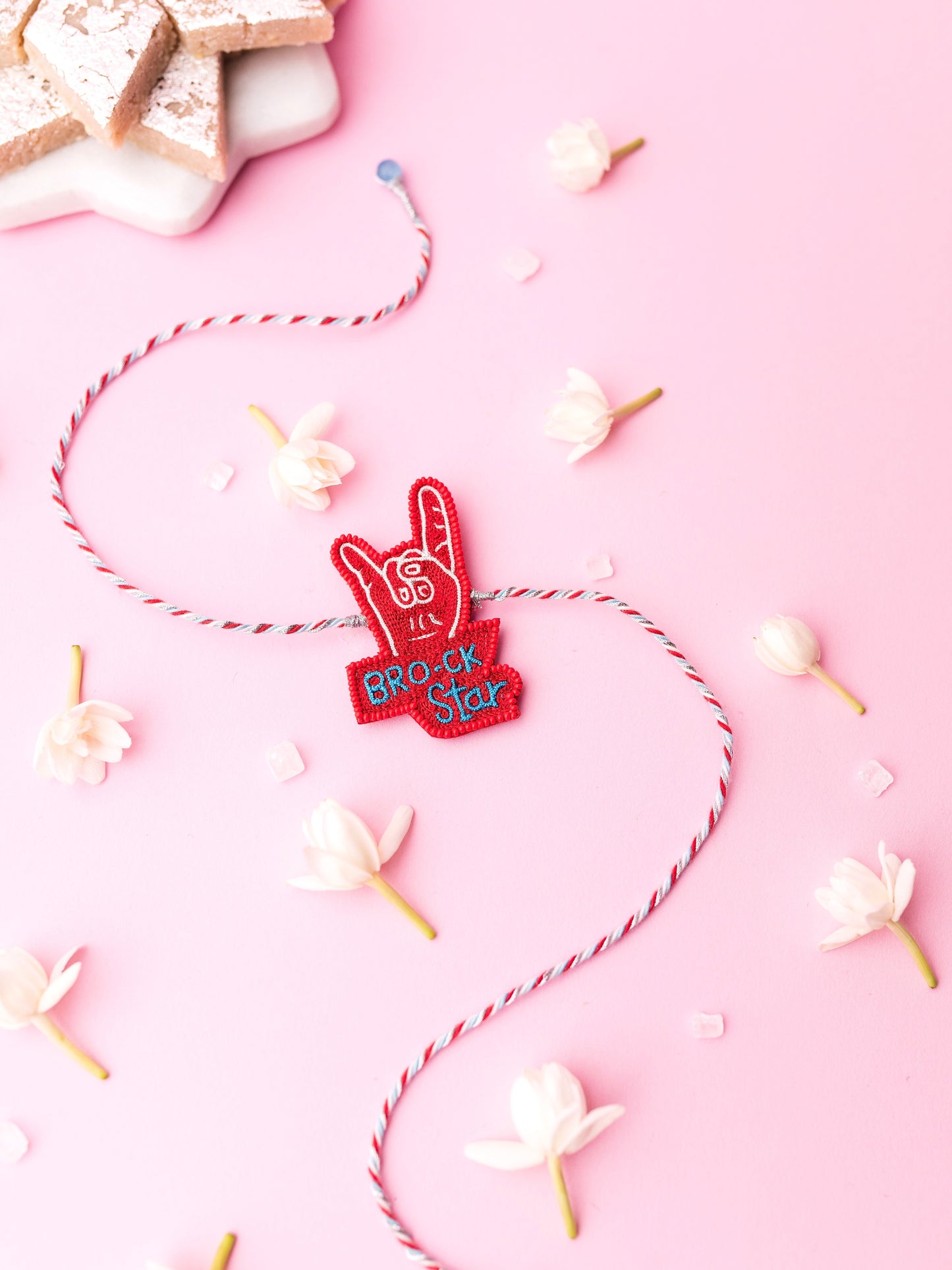 Decorative brother rakhi with brock-star text