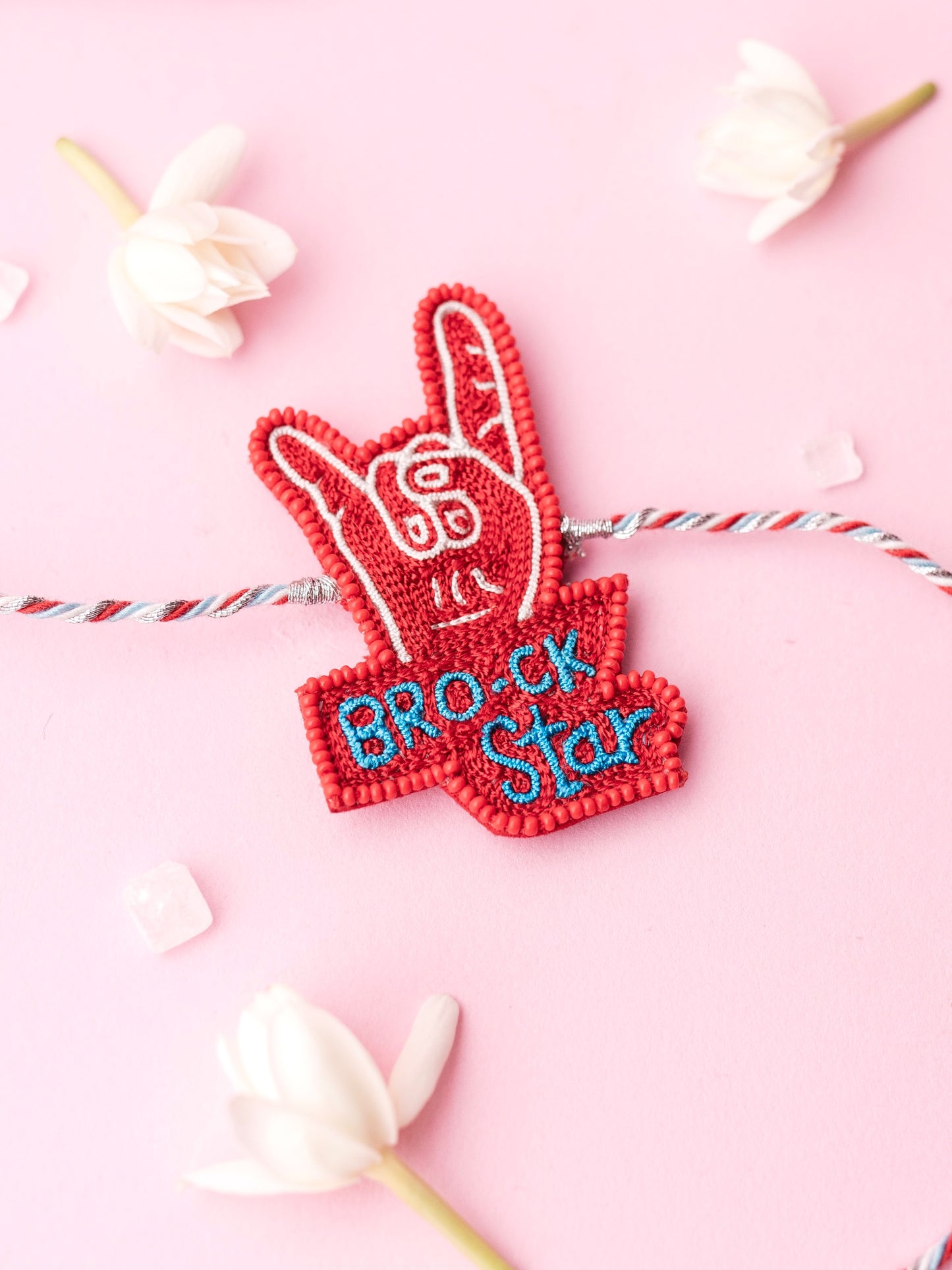 Decorative brother rakhi with brock-star text