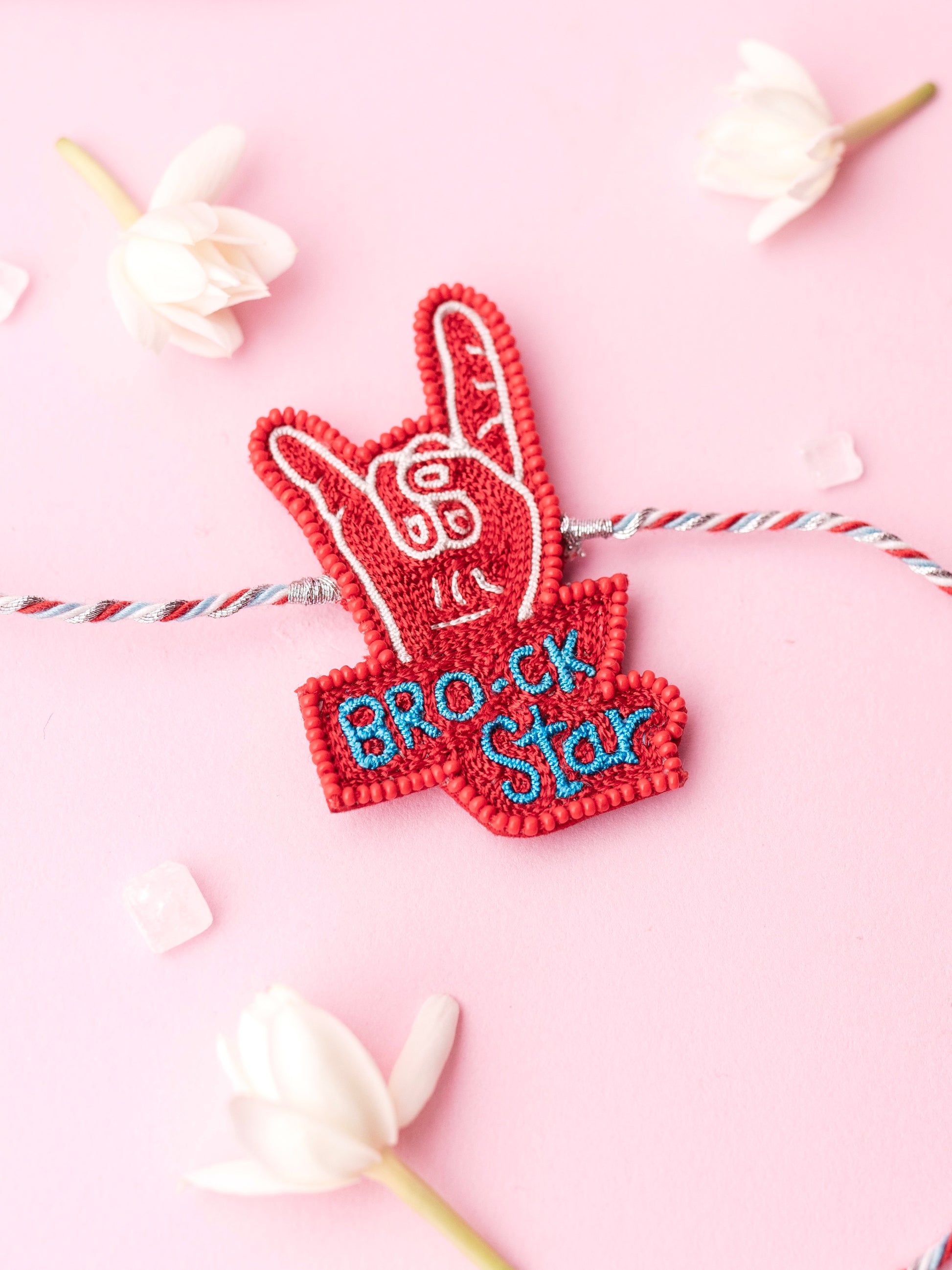 Decorative brother rakhi with brock-star text
