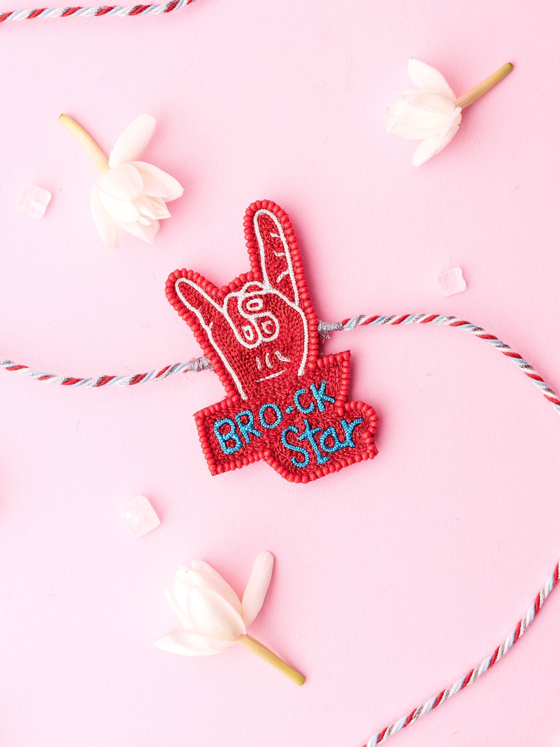 Decorative brother rakhi with brock-star text
