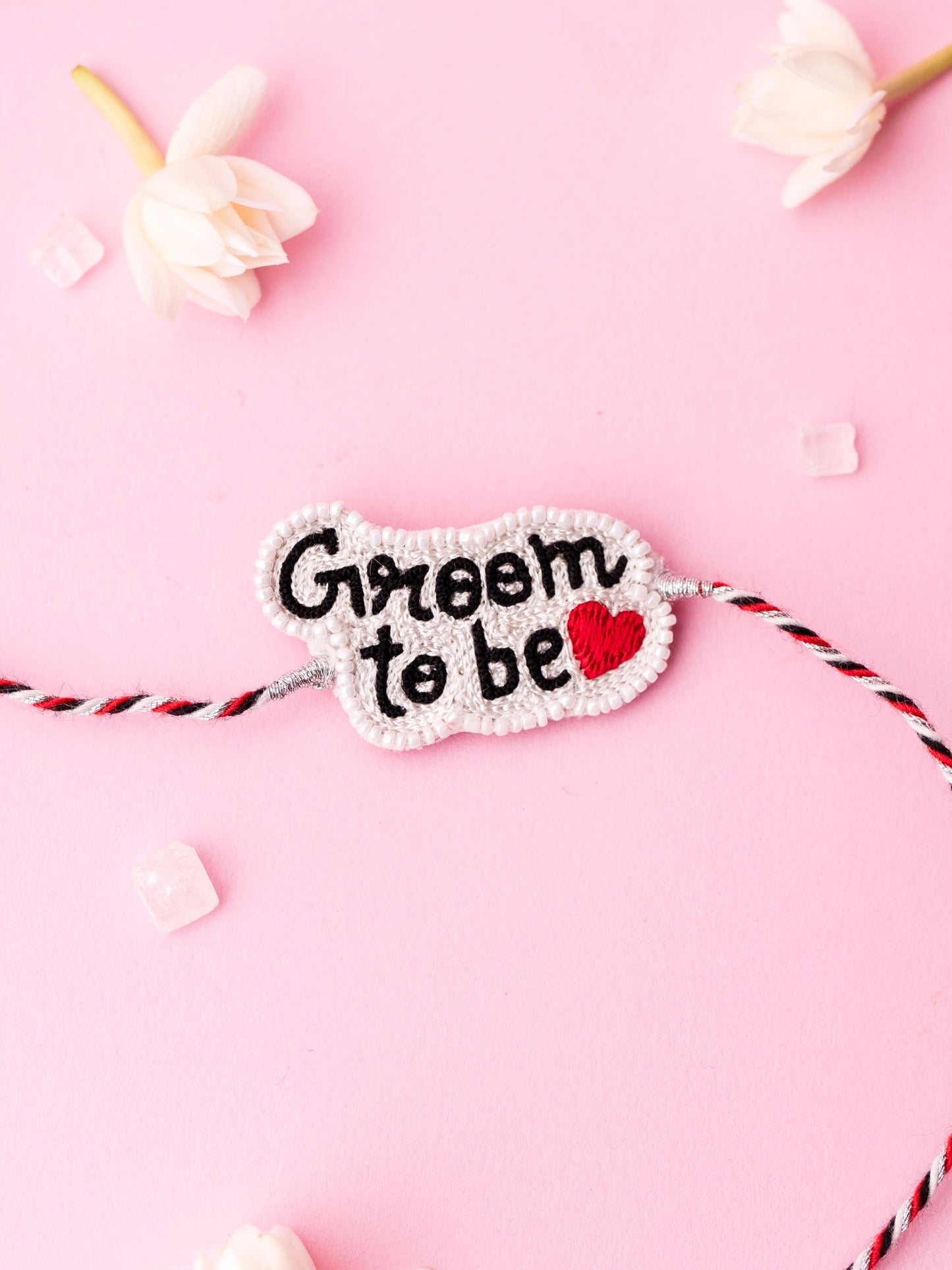 Decorative brother rakhi with groom to be text