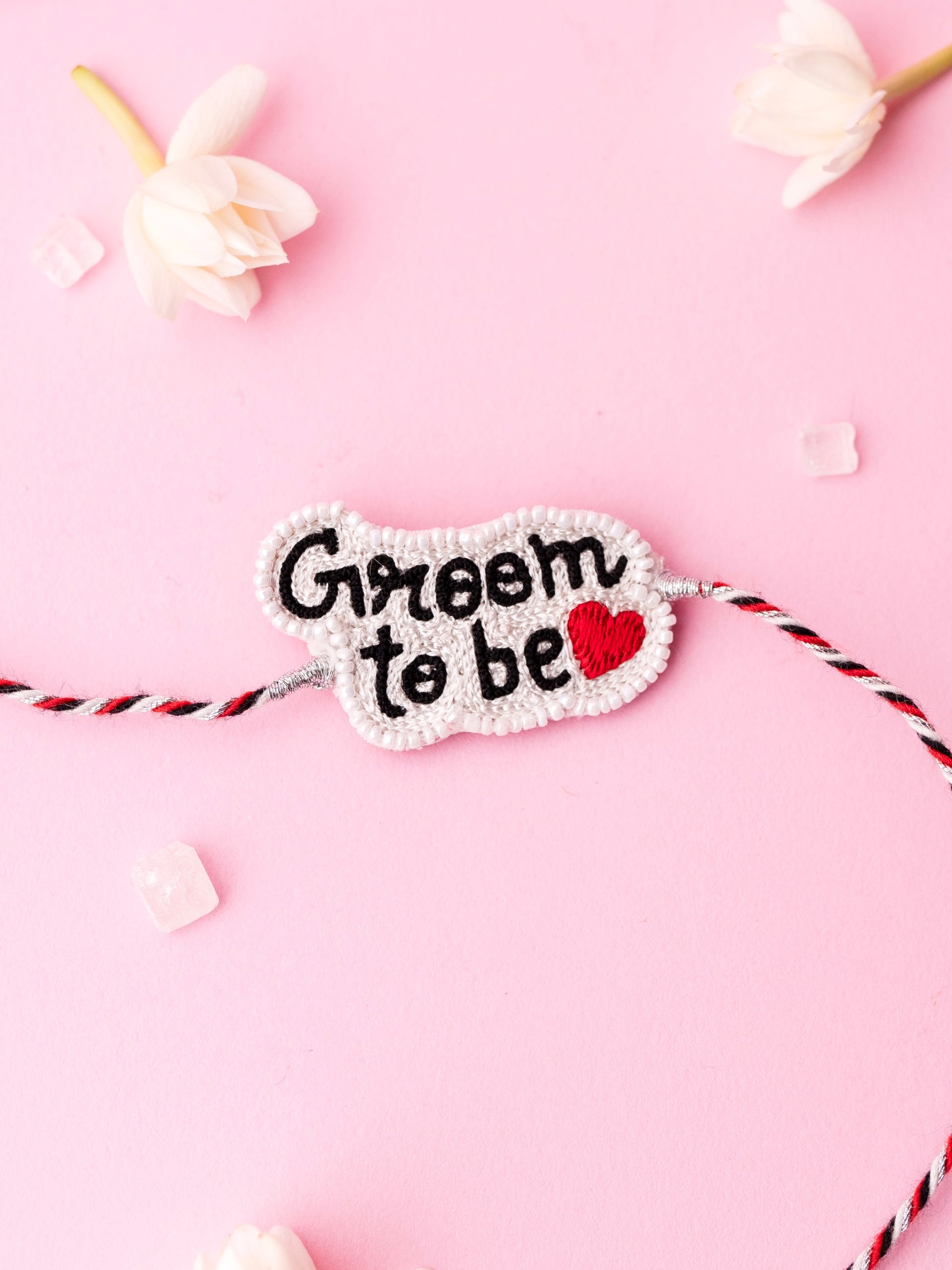 Decorative brother rakhi with groom to be text