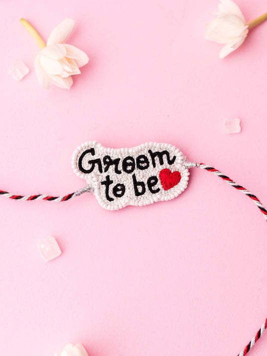 Decorative brother rakhi with groom to be text