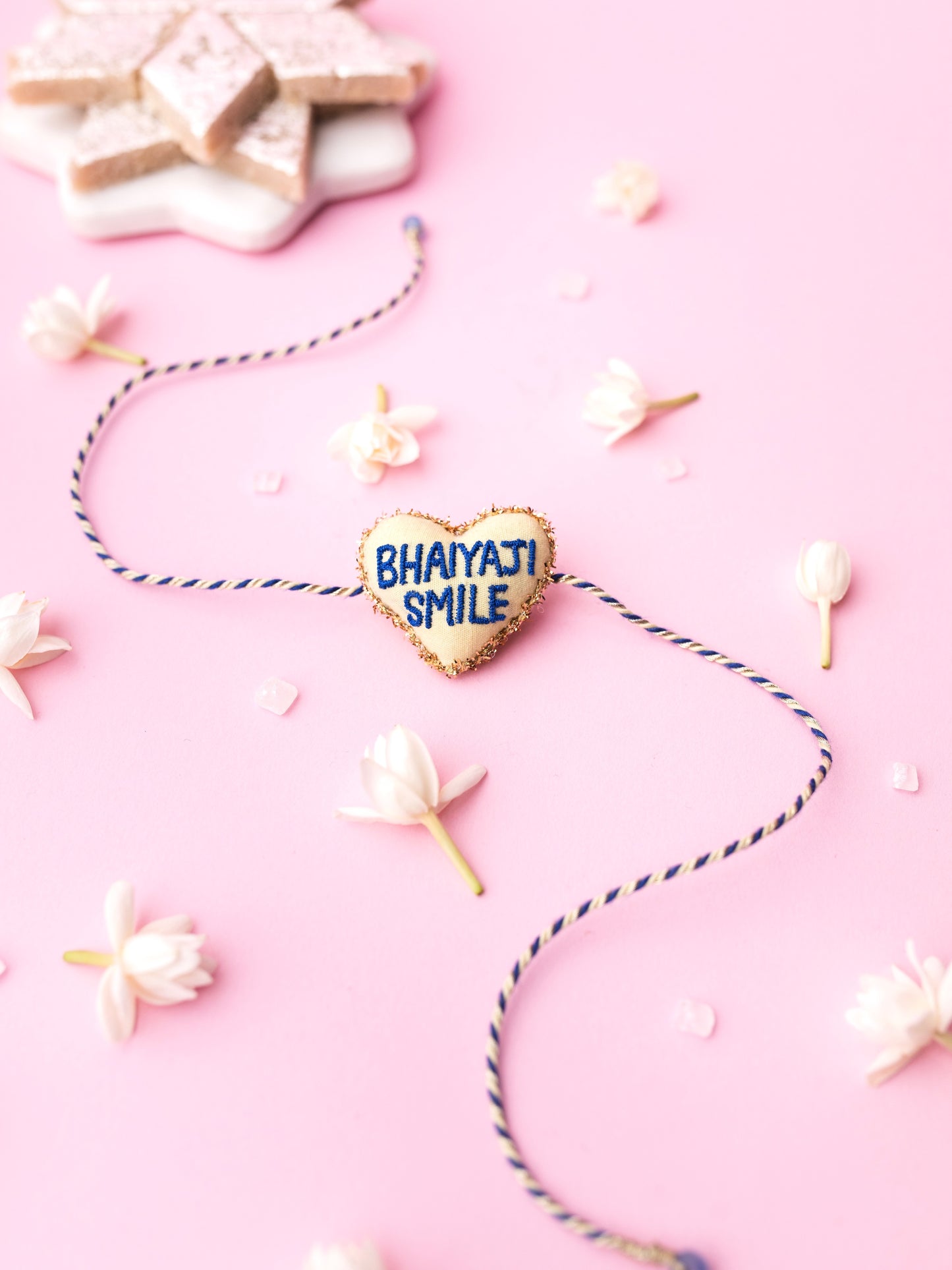 Decorative brother rakhi with bhaiyaji smile text