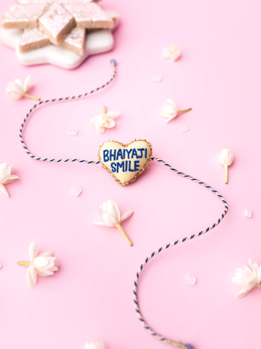 Decorative brother rakhi with bhaiyaji smile text