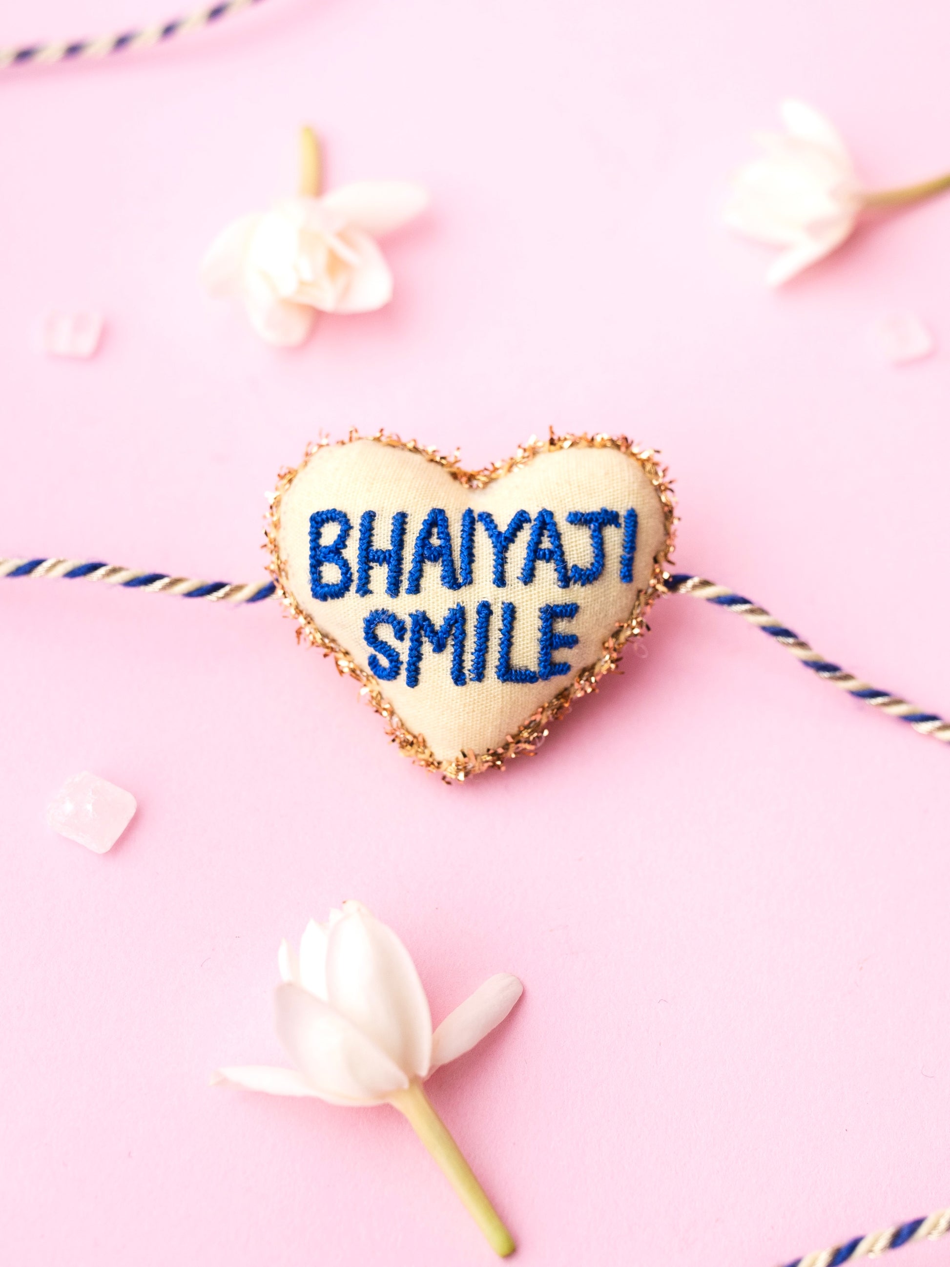 Decorative brother rakhi with bhaiyaji smile text