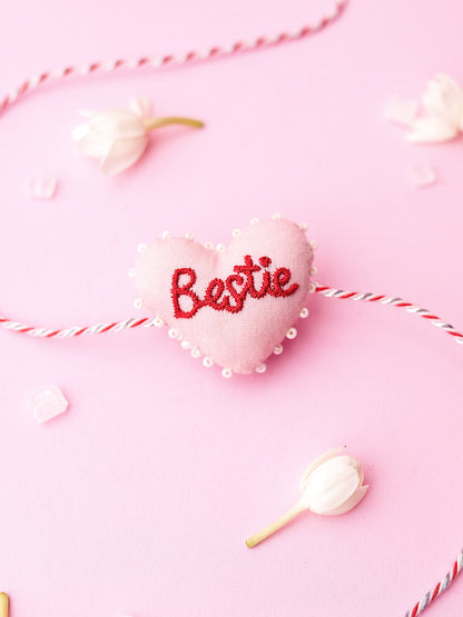 Decorative sister rakhi  with heart-shaped 3D bestie text
