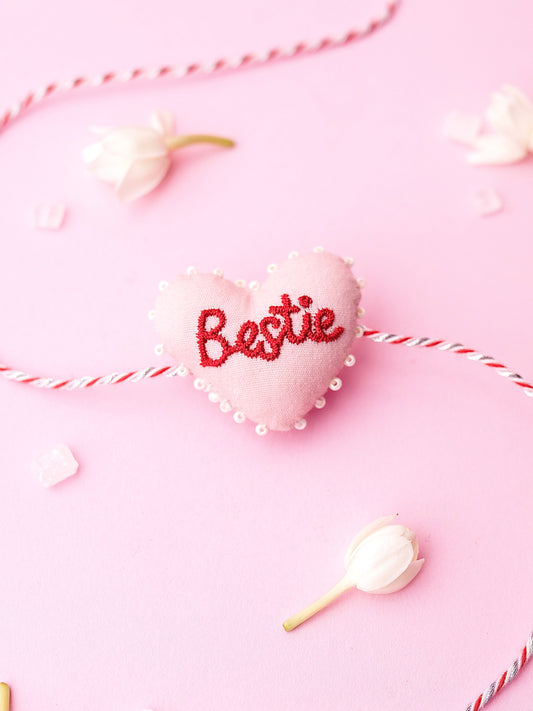 Decorative sister rakhi  with heart-shaped 3D bestie text
