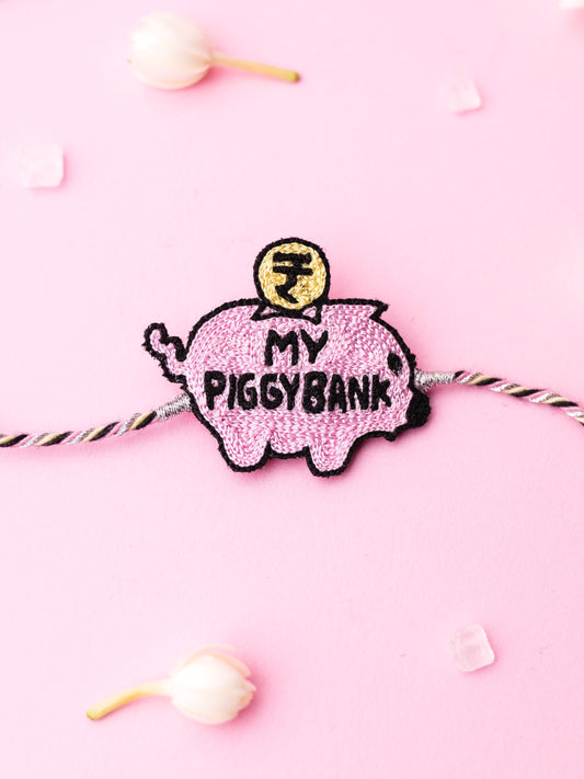 Decorative sister rakhi with my piggy bank text