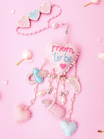 Decorative mom to be lumba rakhi with charms