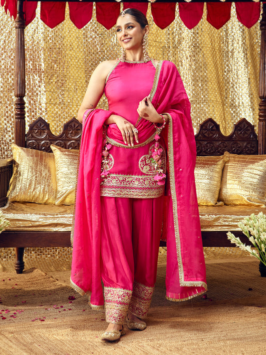 Model wearing the Tota Maina rani pink farshi salwar set with handcrafted festive embroidery