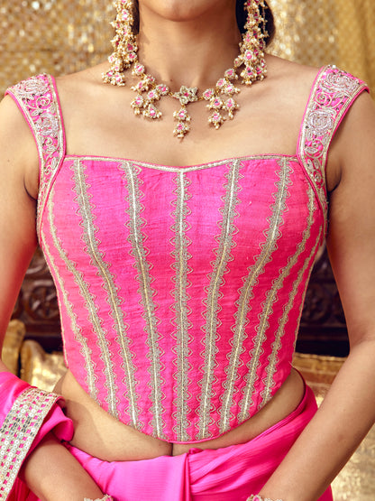 Gulaab hot pink blouse with handcrafted floral embroidery and gold-toned festive details