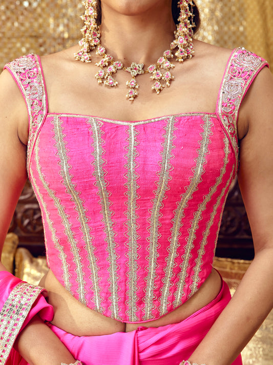 Gulaab hot pink blouse with handcrafted floral embroidery and gold-toned festive details
